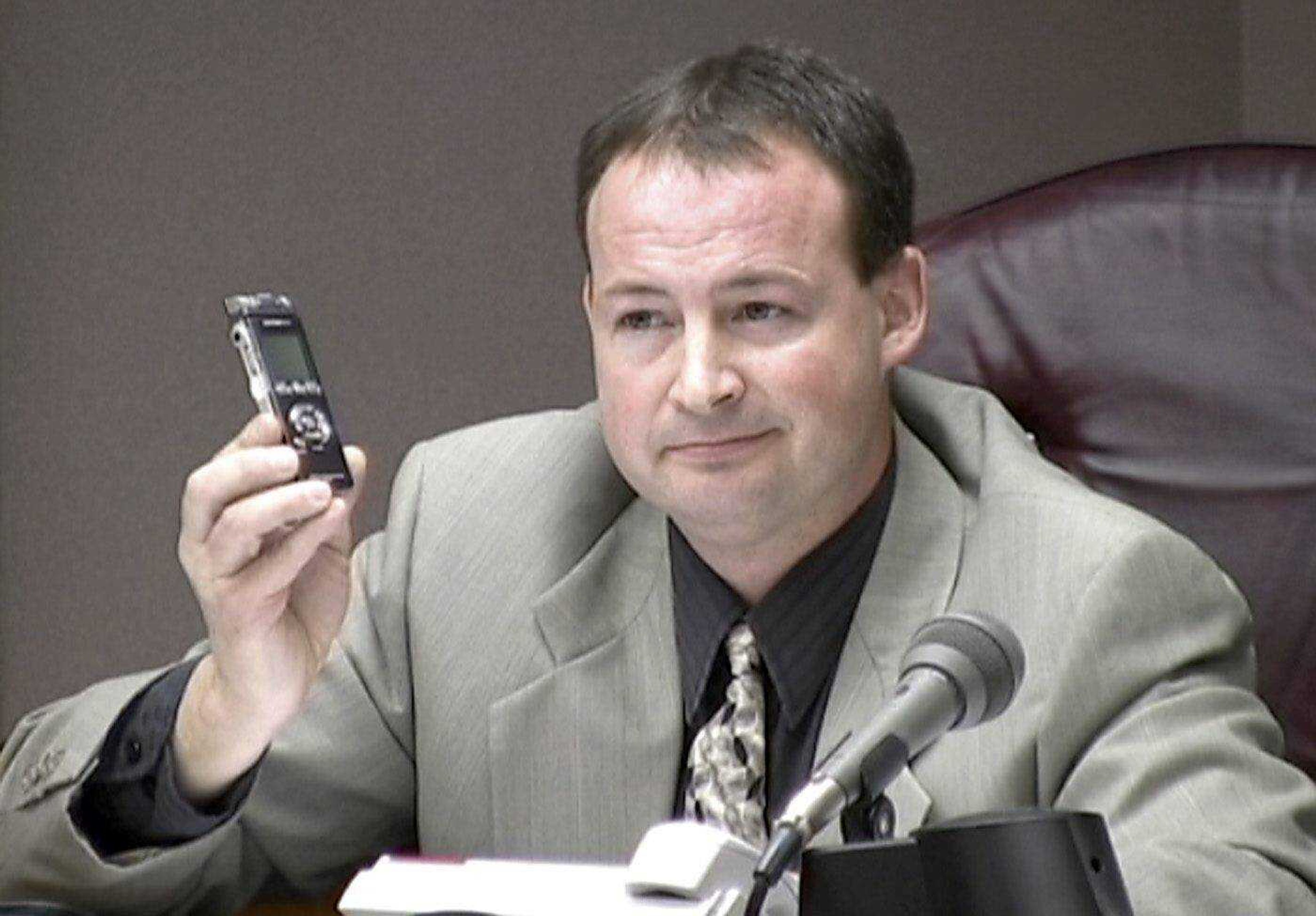 Associate Commissioner Jay Purcell held up an audio recorder used to record a closed session during a meeting of the Cape Girardeau County Commission. Purcell would go on to allege that same closed session violated the Sunshine Law. The Missouri Supreme Court will hear Purcell's Sunshine Law case against the commission Wednesday. (Fred Lynch)