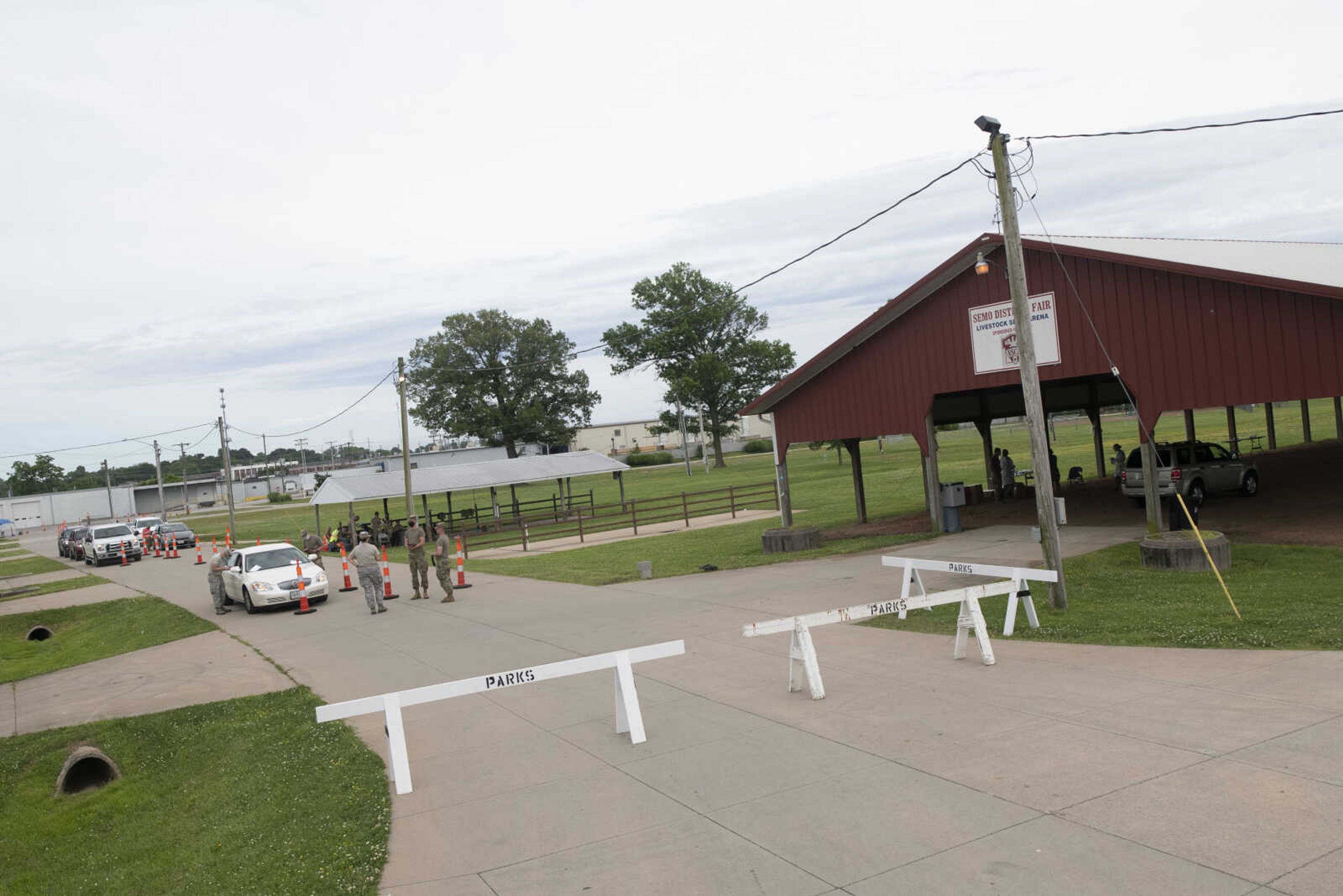 Vehicles wait in line during free COVID-19 testing Friday, June 5, 2020, at Arena Park in Cape Girardeau. The drive-through testing event was scheduled for 7 a.m. to 7 p.m.