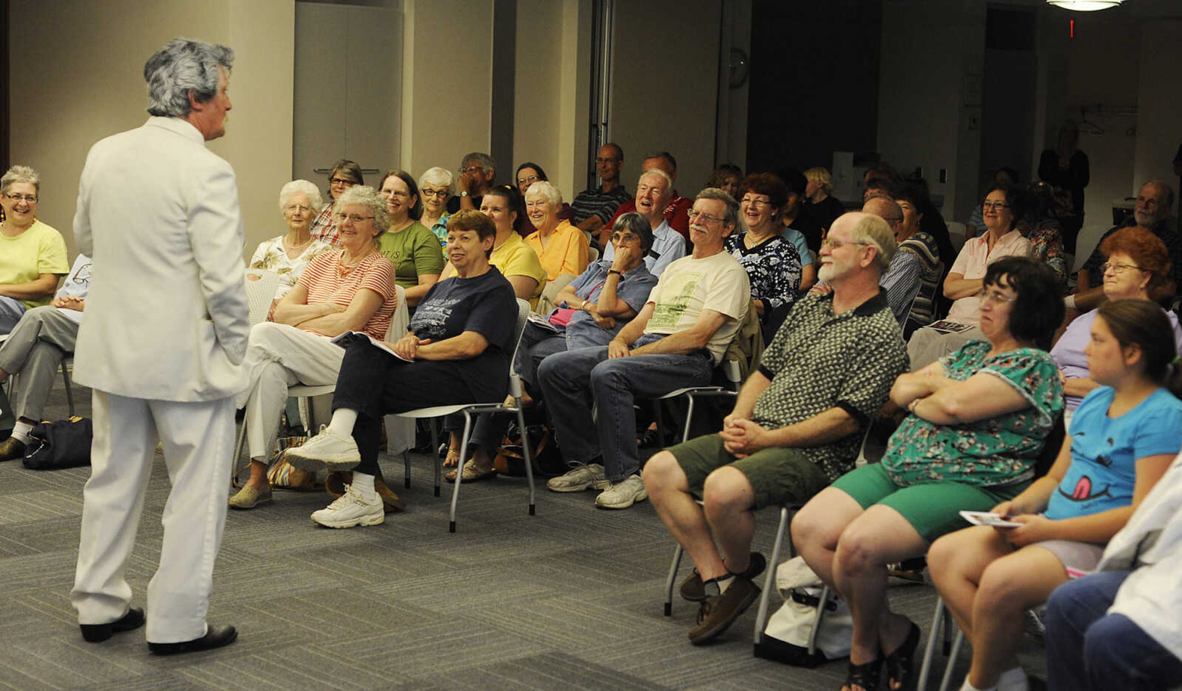 Dan Ehlert performs as Samuel Clemens, who wrote such classic books as "The Adventures of Tom Sawyer" and "The Adventures of Huckleberry Finn," under the pen name Mark Twain, at the Cape Girardeau Public Library. Ehlert has performed the Mark Twain Library program in 42 states. (Adam Vogler)