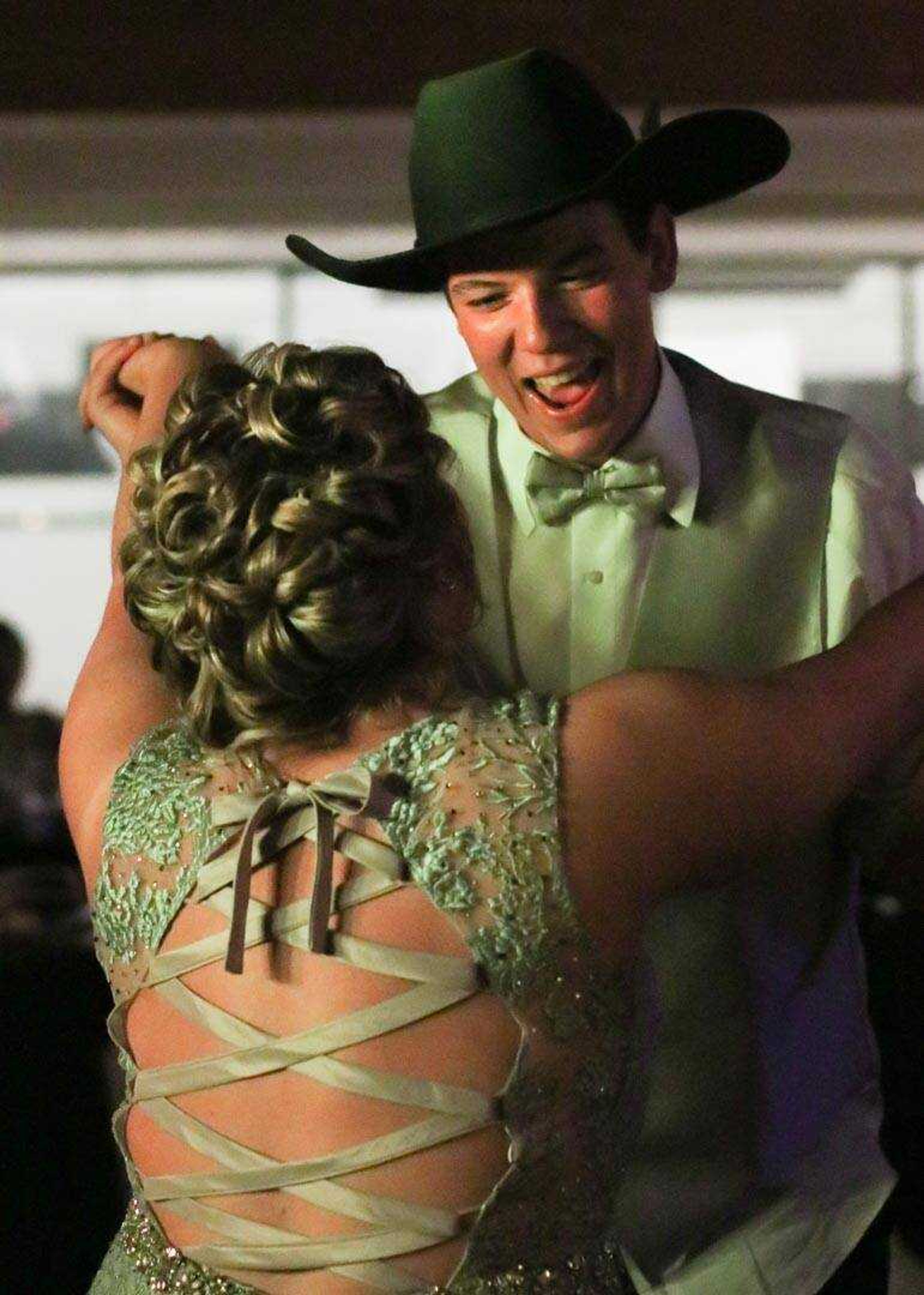 KATE MARSHALL ~ Special to the Southeast Missourian 

Returning prom queen Jenna Garland and her boyfriend Weston Iverson dance together during the Woodland Prom Saturday, April 13, 2019, at the Southeast Missouri State University Center  in Cape Girardeau .