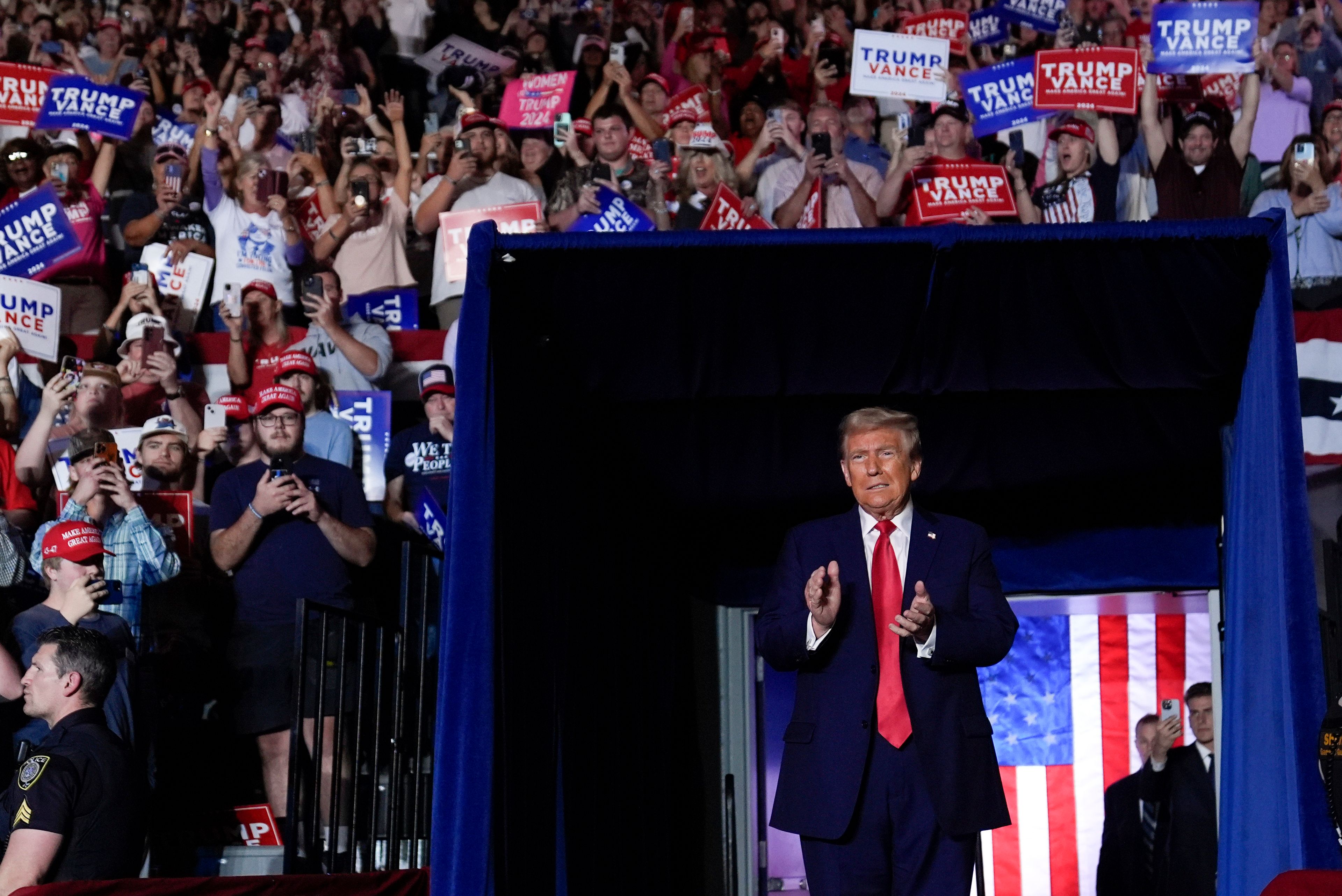 Republican presidential nominee former President Donald Trump arrives for a campaign rally at Williams Arena at Mignes Coliseum, Monday, Oct. 21, 2024, in Greenville, N.C. (AP Photo/Evan Vucci)