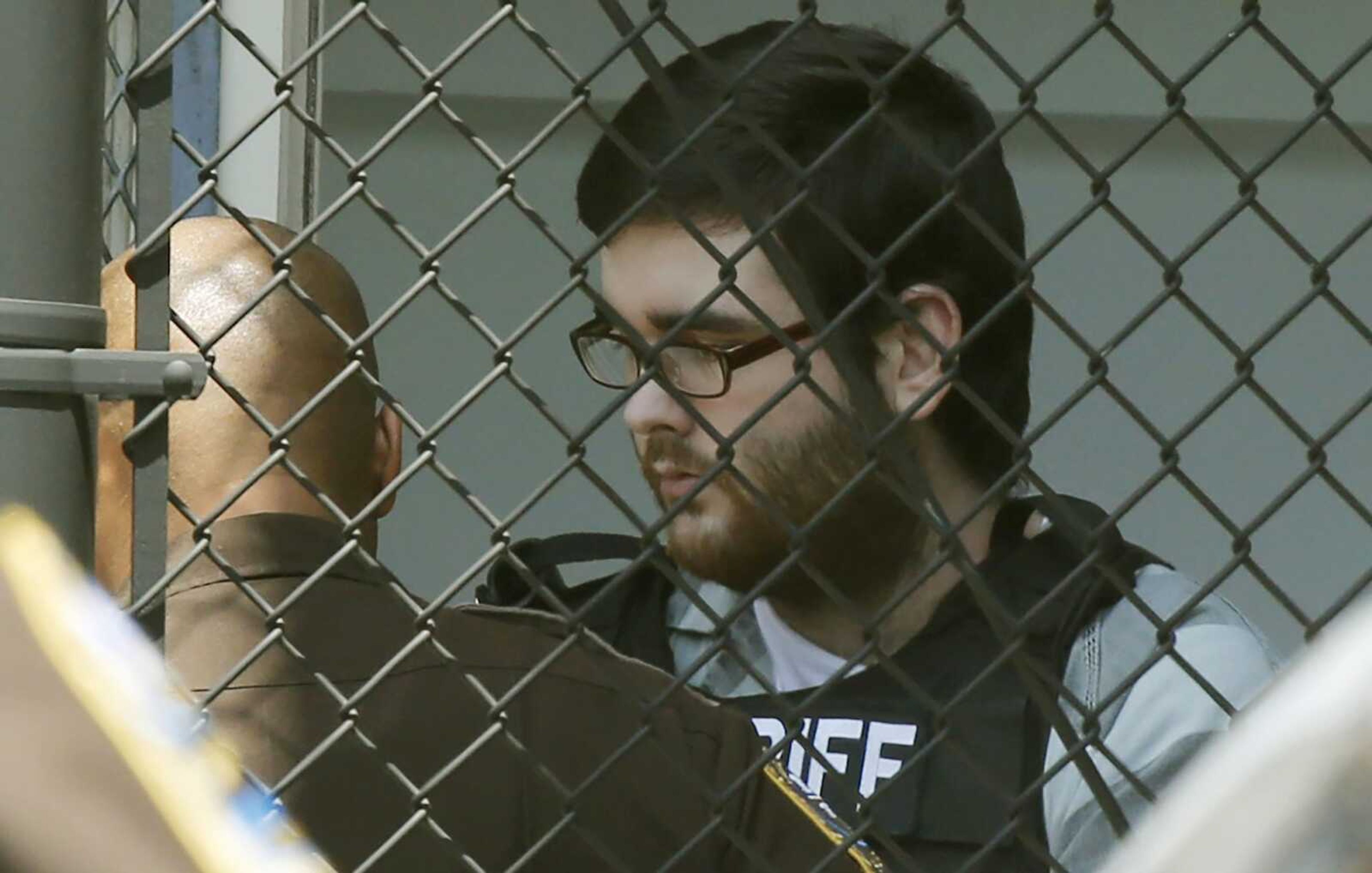 James Alex Fields Jr. is led out of General District Court after his sentencing on state charges Monday in Charlottesville, Virginia