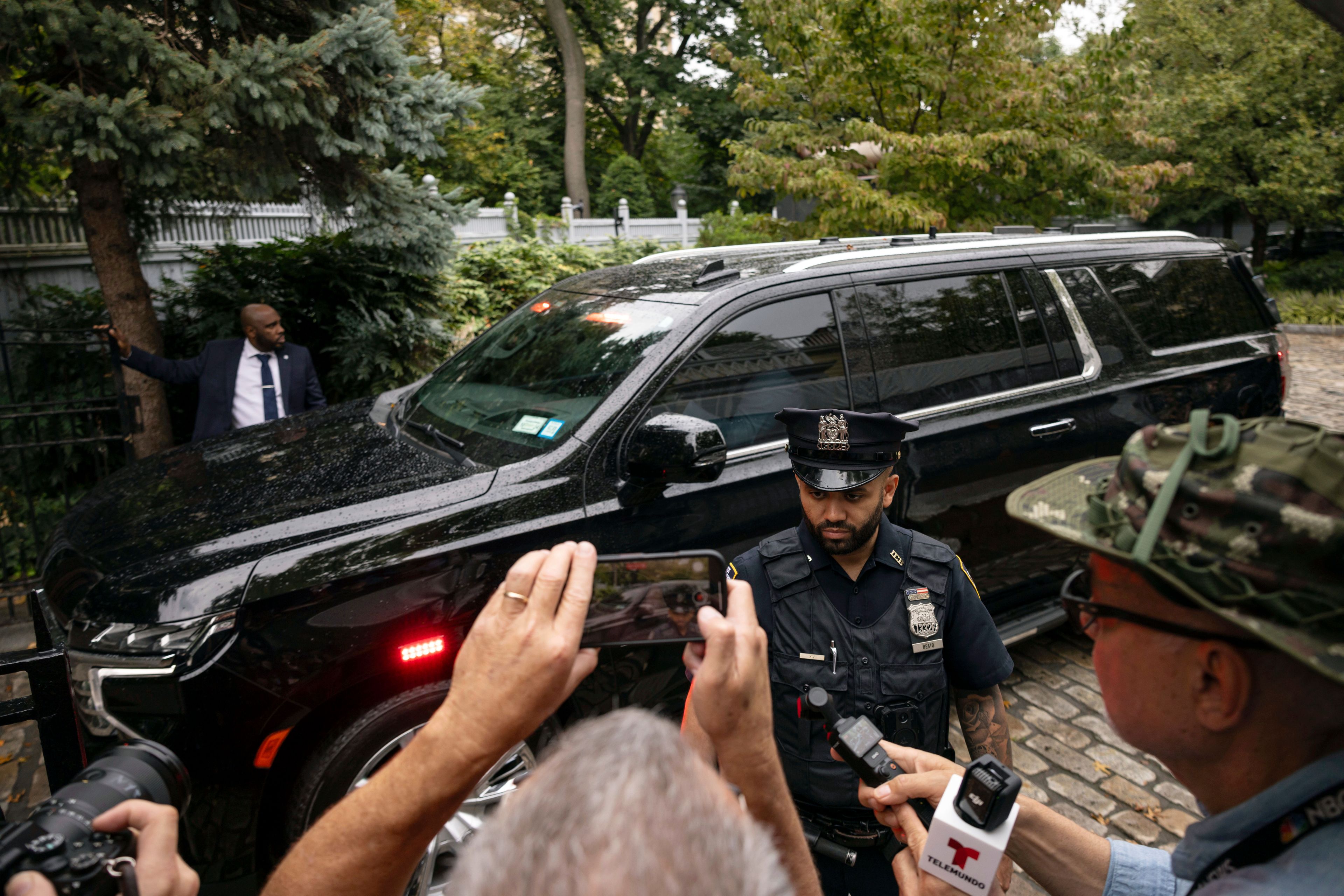 A car carrying New York City Mayor Eric Adams exits Gracie Mansion, the official residence of the mayor, Thursday, Sept. 26, 2024, in New York. (AP Photo/Yuki Iwamura)