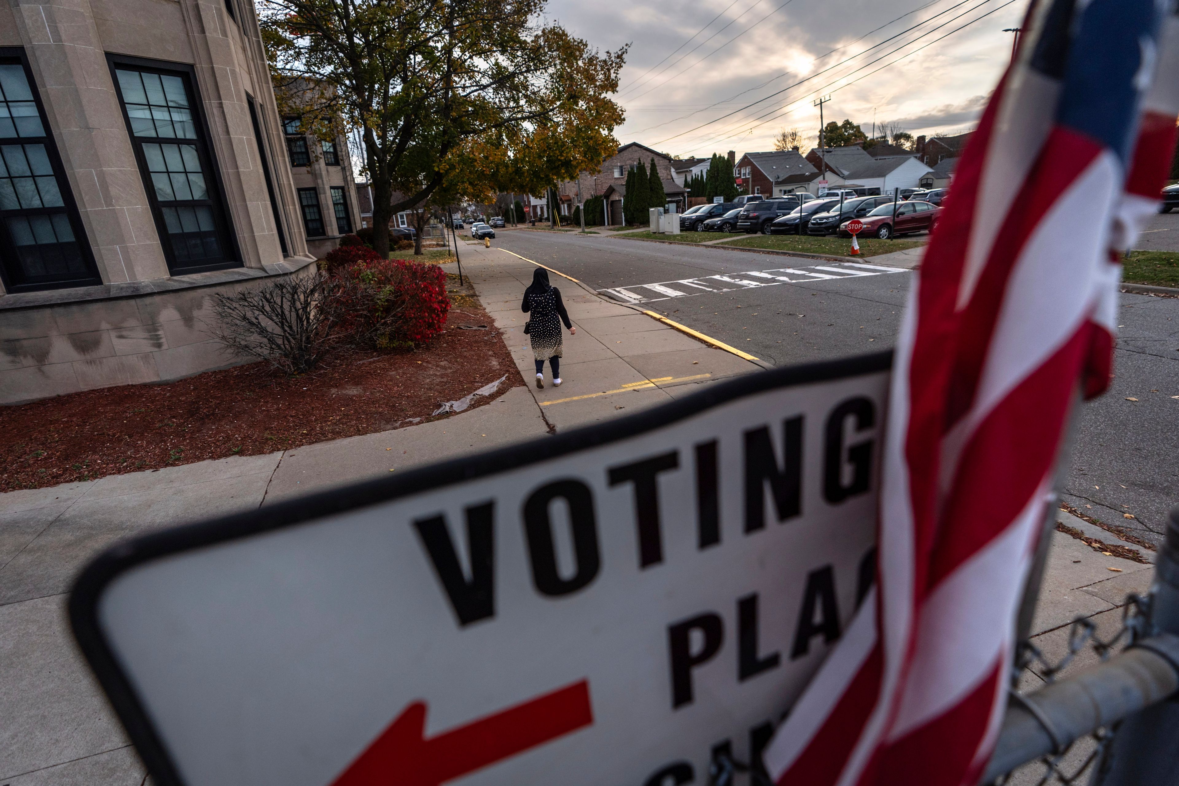 A voter leaves a polling site after casting a ballot on Election Day, Tuesday, Nov. 5, 2024, in Dearborn, Mich., the nation's largest Arab-majority city. (AP Photo/David Goldman)