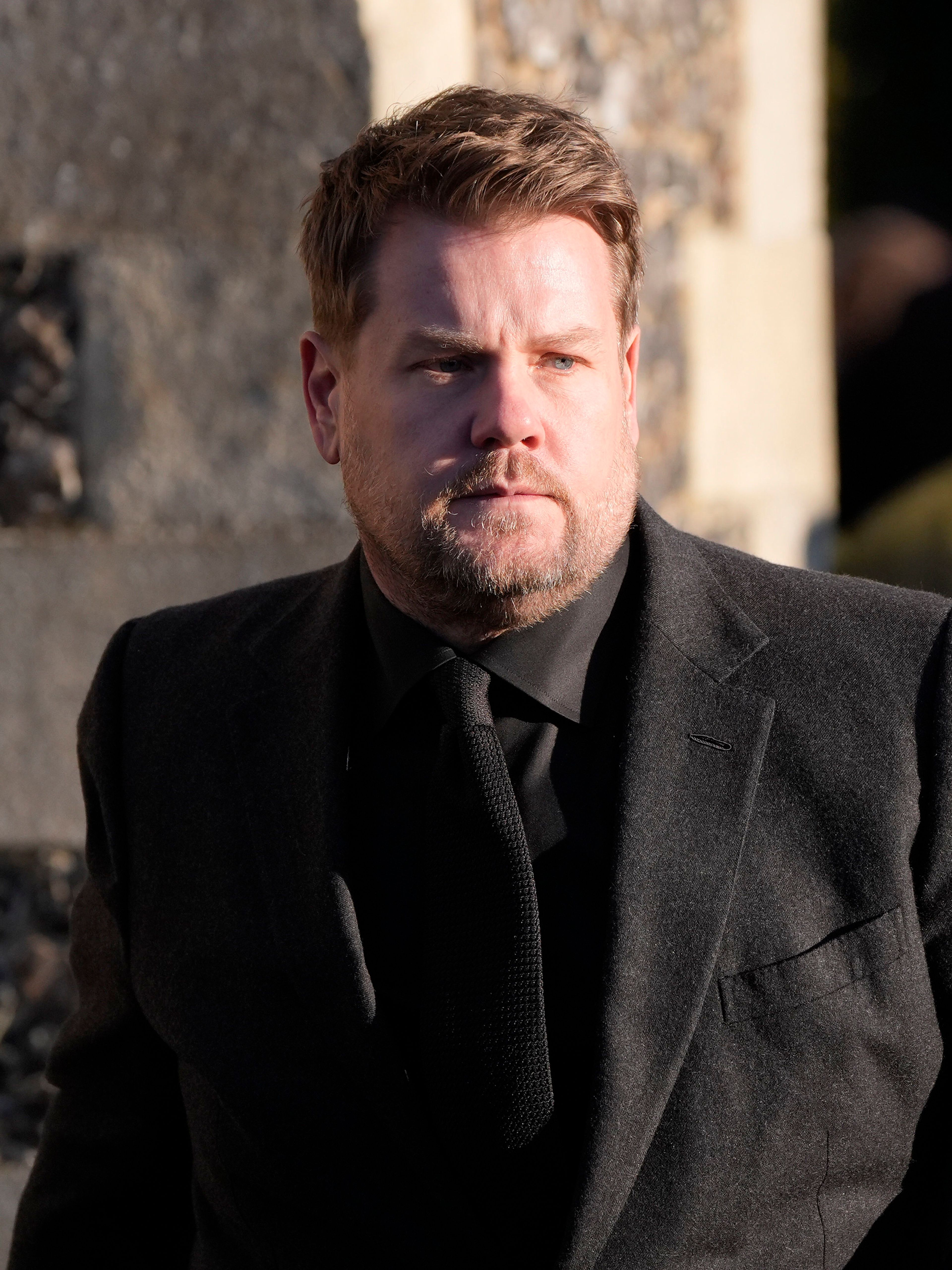 James Corden walks after the funeral service of One Direction singer Liam Payne at St Mary's Church in Amersham, England, Wednesday, Nov. 20, 2024. (Andrew Matthews/PA via AP)