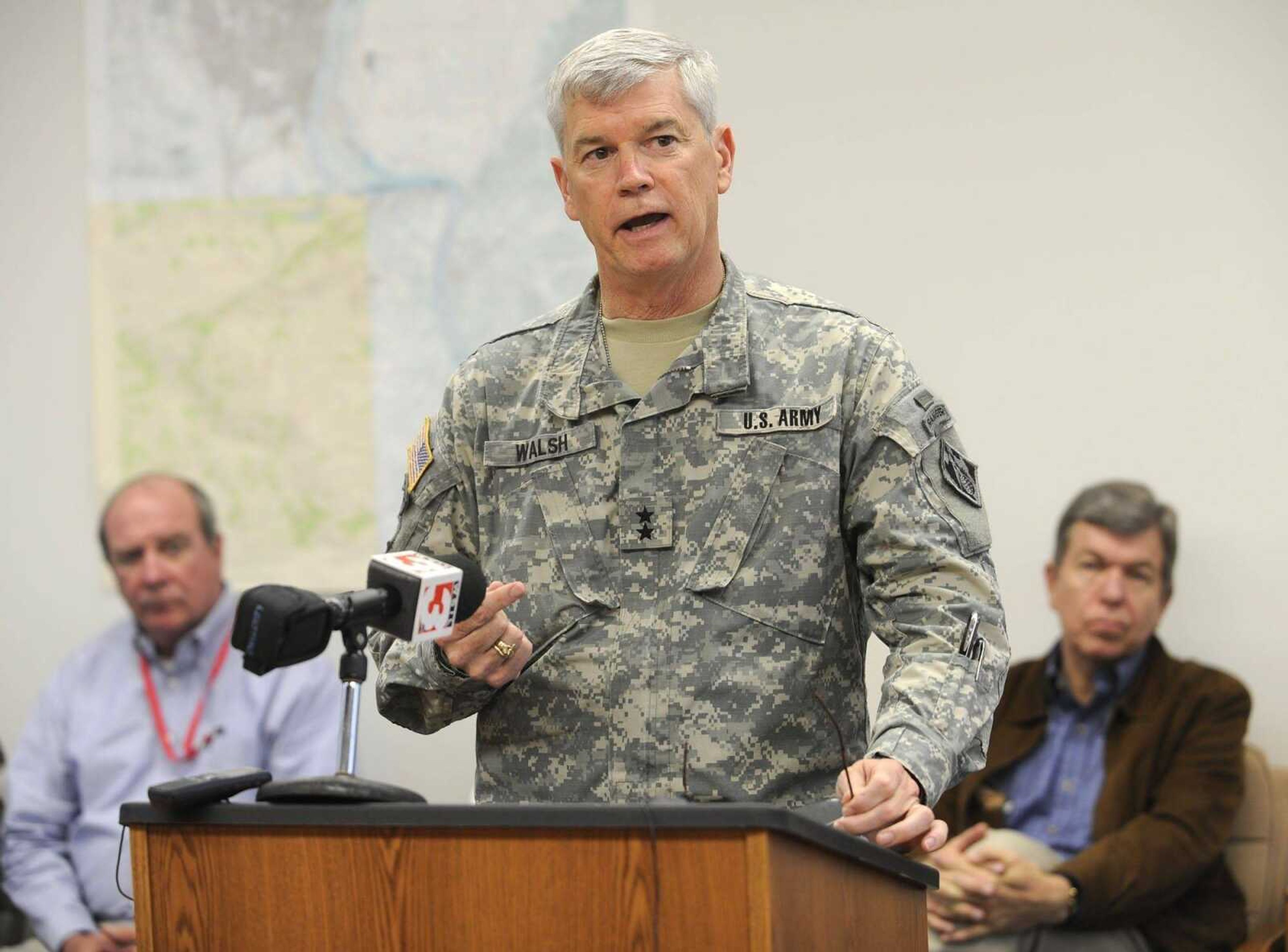 Maj. Gen. Michael Walsh, president of the Missouri River Commission, speaks at a news conference Sunday, May 1, 2011 at the Southeast Missouri Regional Port. Also attending were commissioner R.D. James, left, and U.S. Senator Roy Blunt. (Fred Lynch)