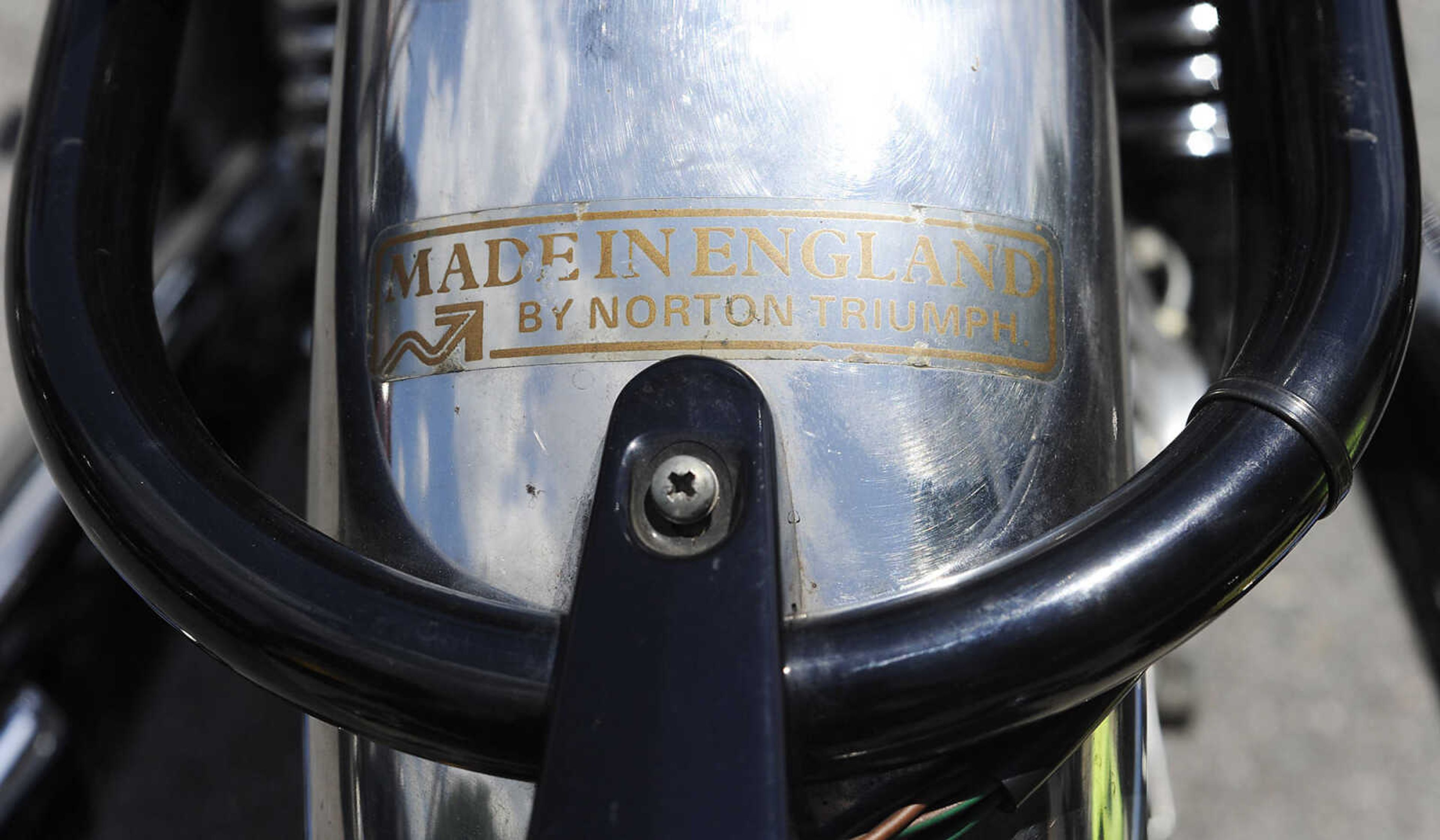 The rear fender of a 1975 Norton Commando 850 motorcycle at the Bikes on the River Vintage Motorcycle Show Saturday, June 8, at Grass Roots BMW, 28 S. Spanish St., in Cape Girardeau. Approximately 50 vintage motorcycles, and numerous newer bikes, were on display at the show which is in its second year and sponsored by Grass Root BMW. While there was no entry fee money was collected to be donated to St. Jude Children's Research Hospital. Organizers plan on holding the show again next year.