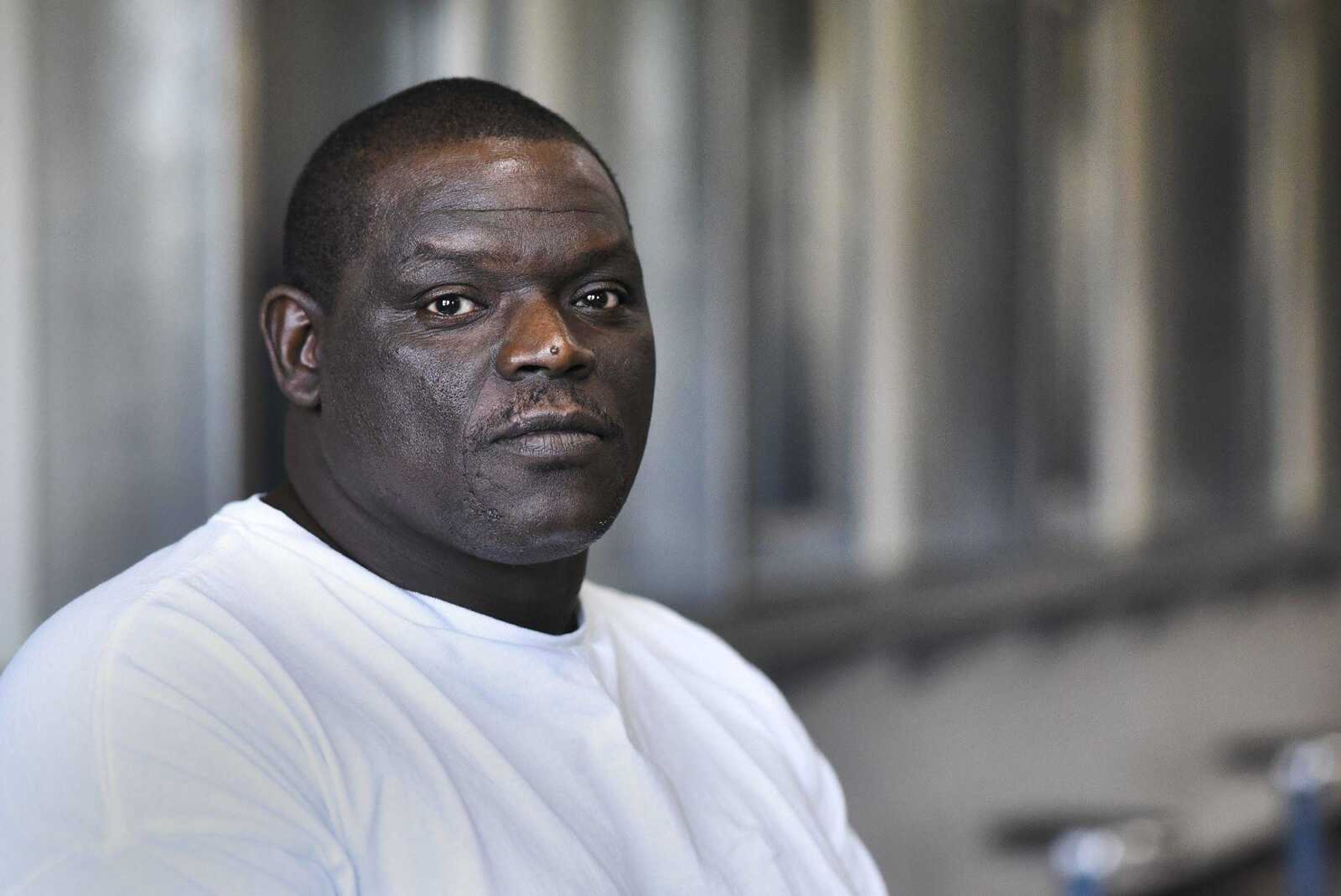 David Robinson poses for a portrait in the visiting area inside Jefferson City Correctional Center in September. 