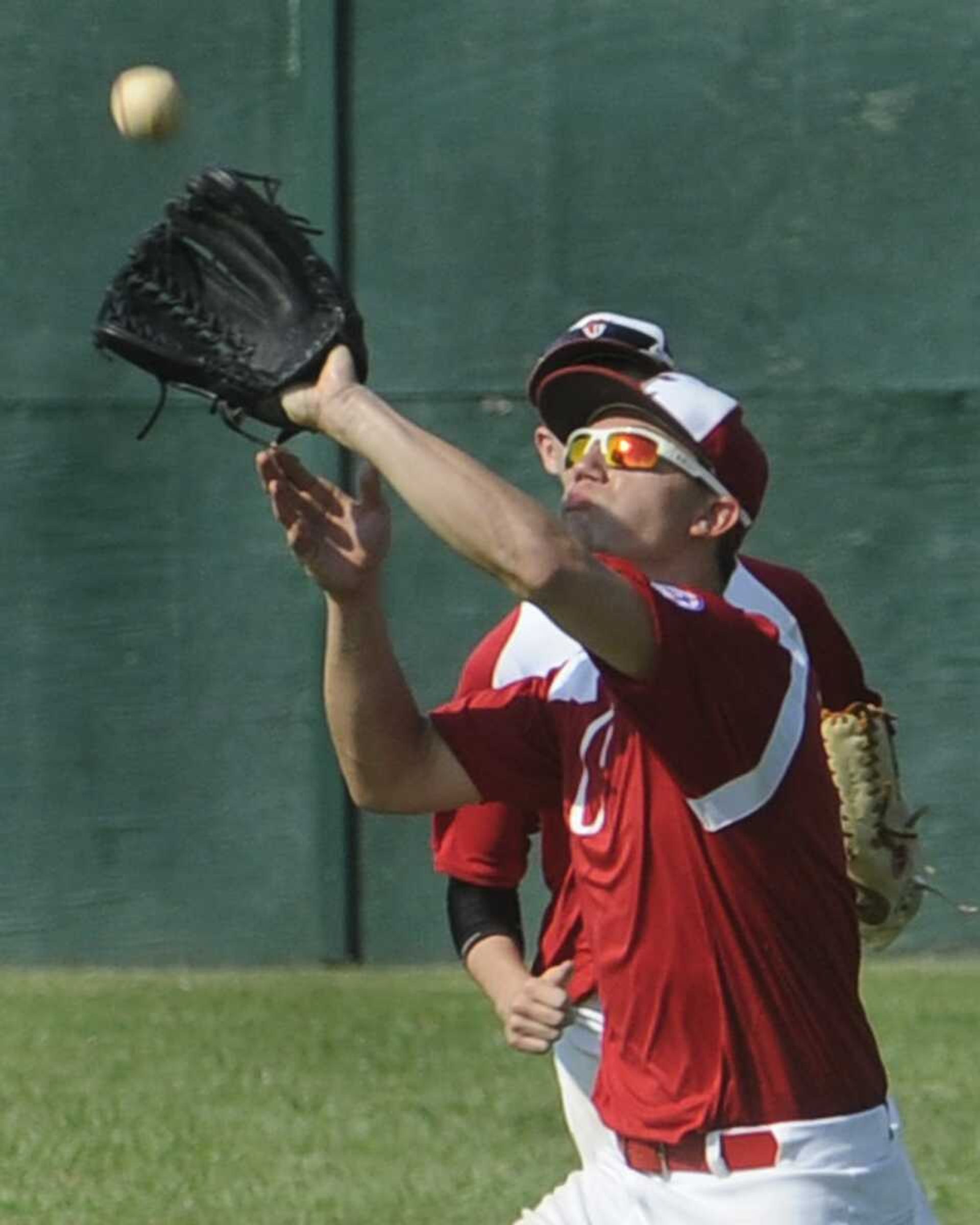 Chaffee right fielder Josh Overbey hauls in an Iowa popup Saturday during the second inning in the Midwest Plains Regional tournament in Charleston, Mo. (Fred Lynch)