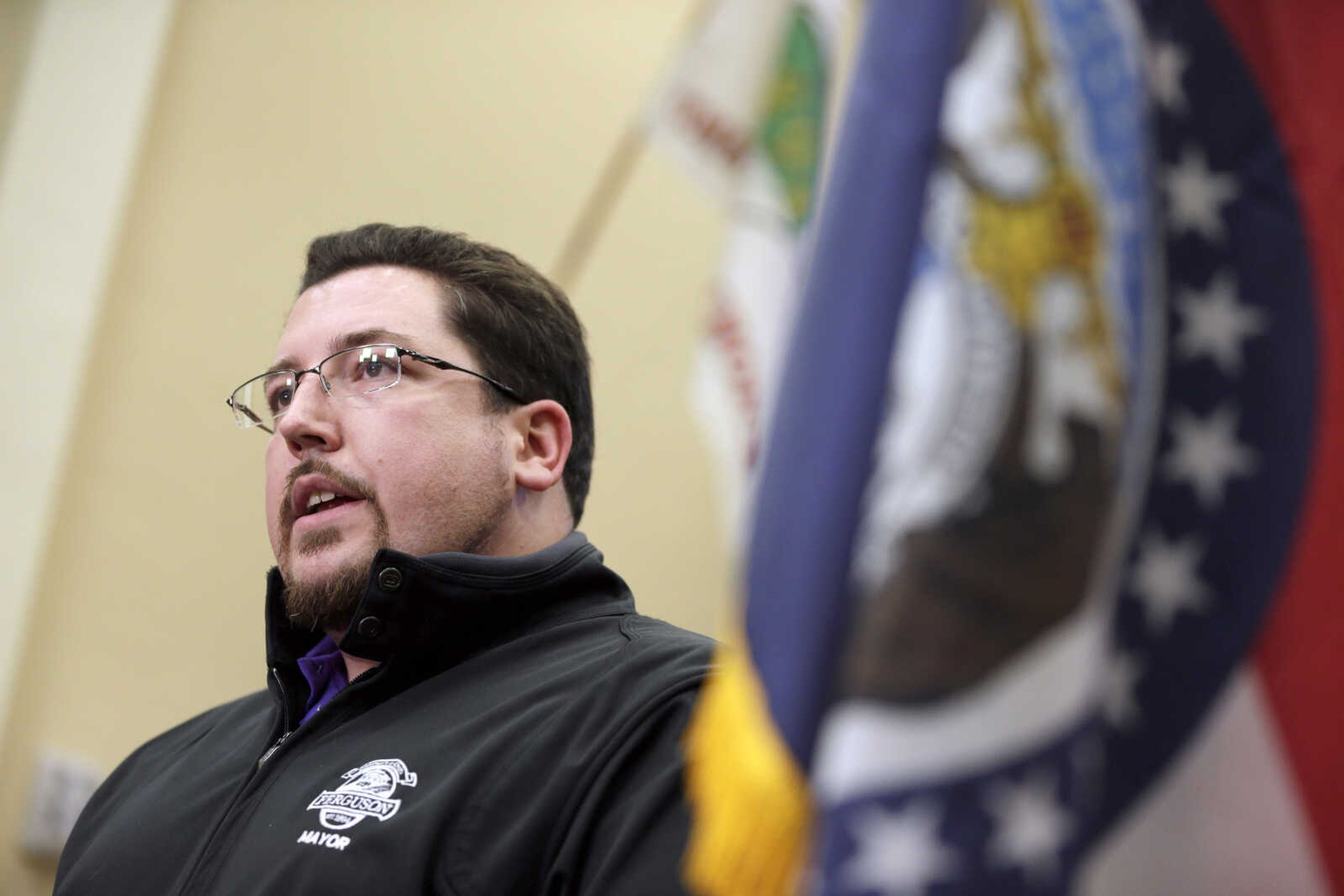 Ferguson Mayor James Knowles III announces the resignation of police chief Thomas Jackson during a news conference March 11 in Ferguson, Missouri. (Jeff Roberson ~ Associated Press file)