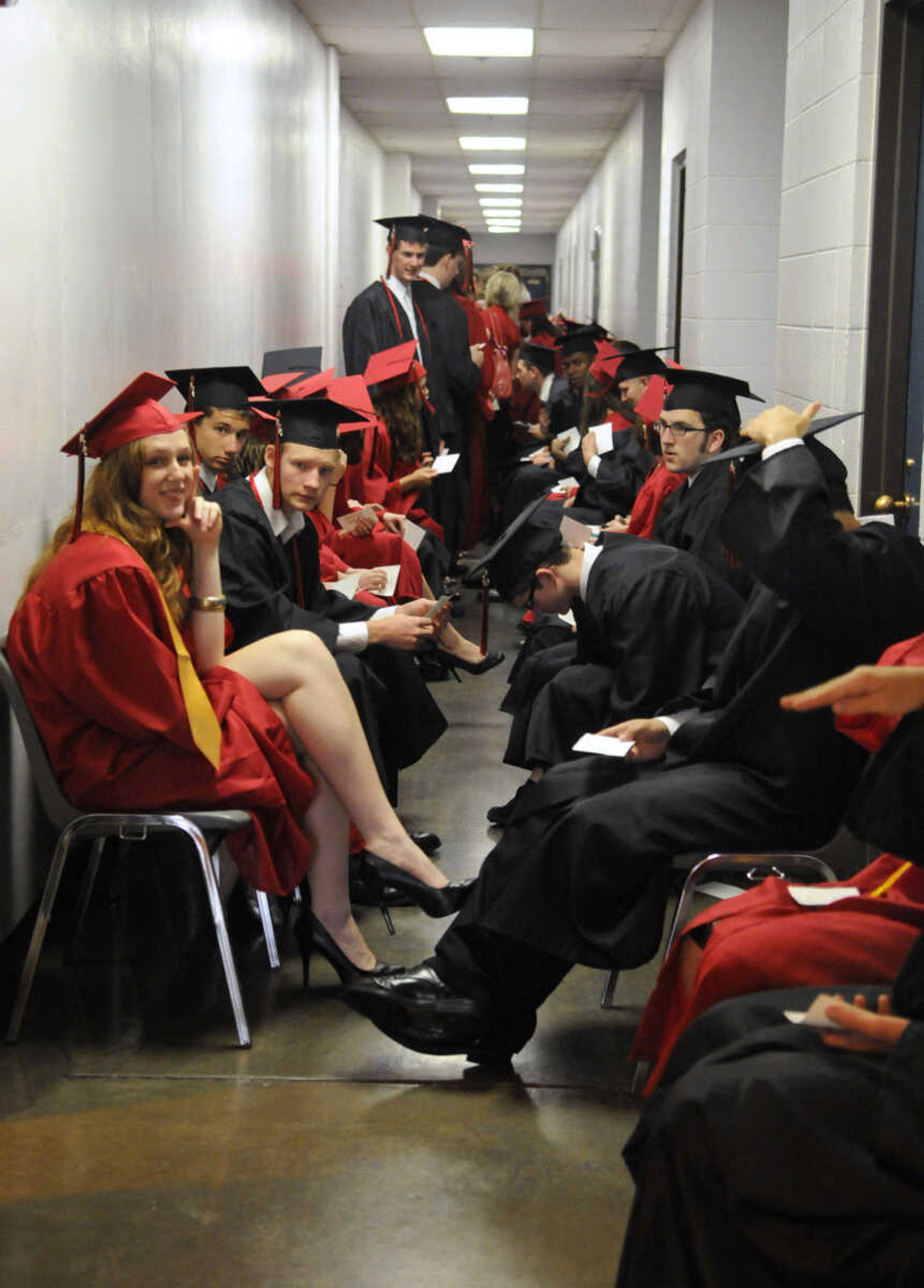 KRISTIN EBERTS ~ keberts@semissourian.com

Students line up in the hallway before Jackson High School's commencement ceremony at the Show Me Center in Cape Girardeau, Mo., on Thursday, May 20, 2010.