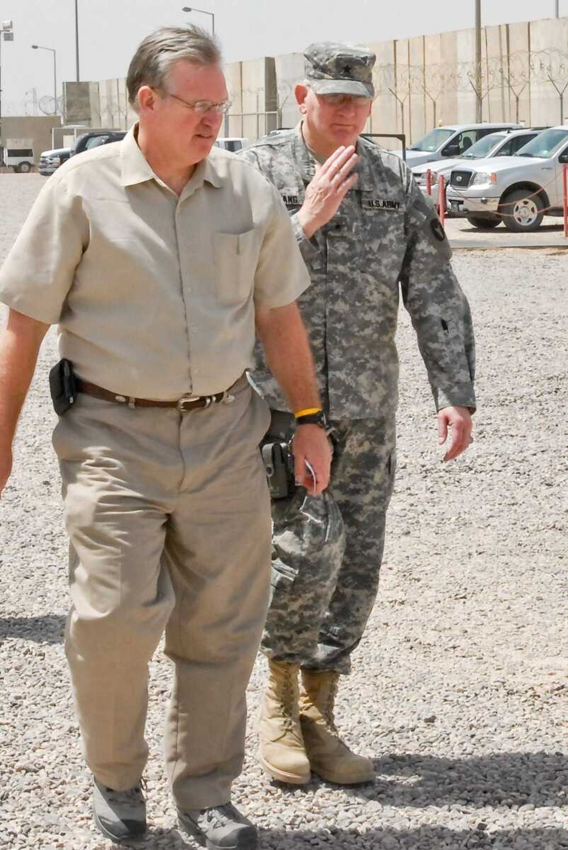 Missouri Gov. Jay Nixon is accompanied by Brig. Gen. Gerald Lang during a visit with troops Sunday at Contingency Operating Base in Basra, Iraq. (Sgt. Frank Vaughn ~ U.S. Army)