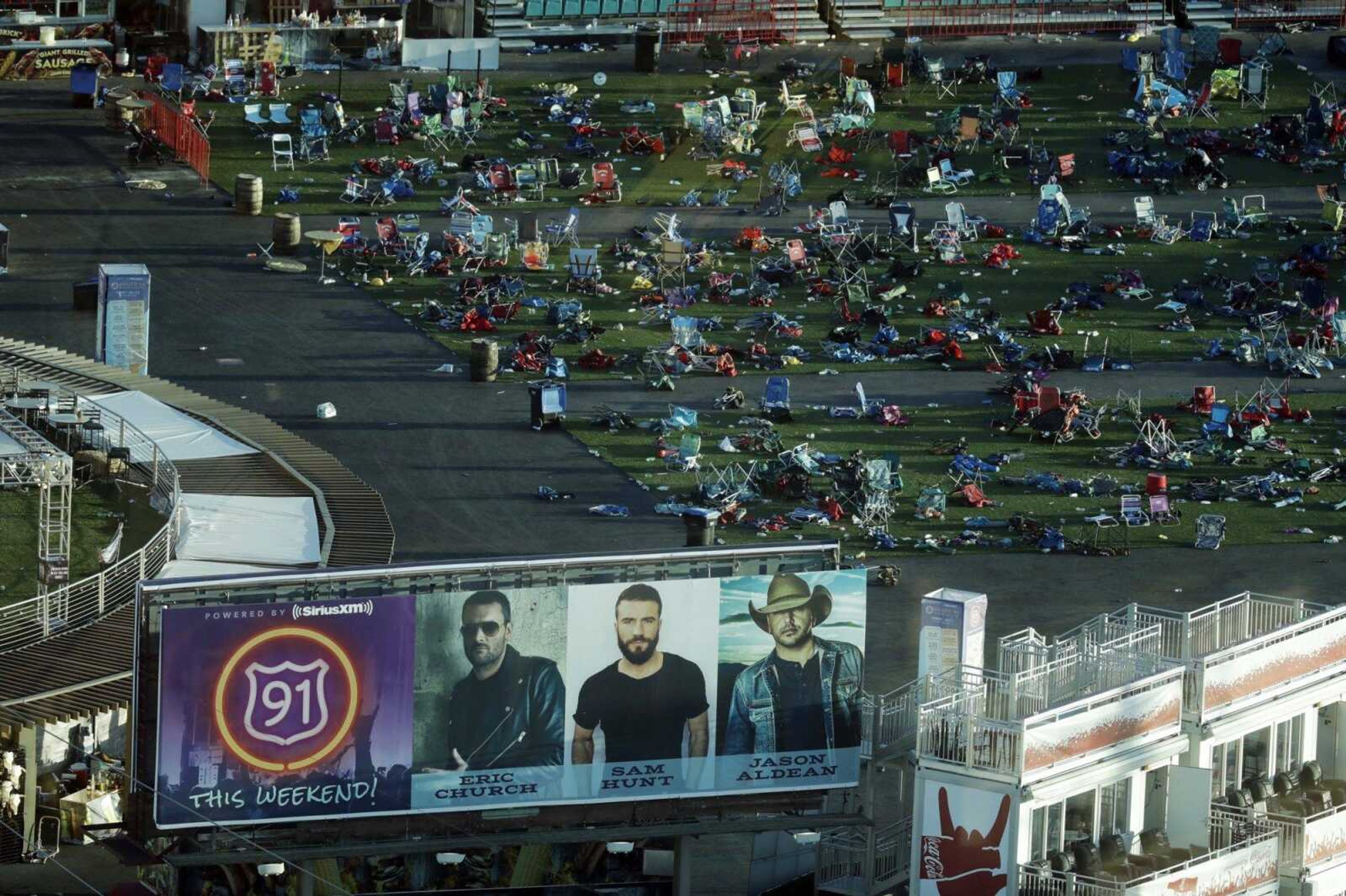 In this photo from Tuesday, personal belongings and debris littered the Route 91 Harvest festival grounds across the street from the Mandalay Bay resort and casino in Las Vegas. Personal belongings remaining from the deadliest mass shooting in modern histor were returned to their owners Sunday.