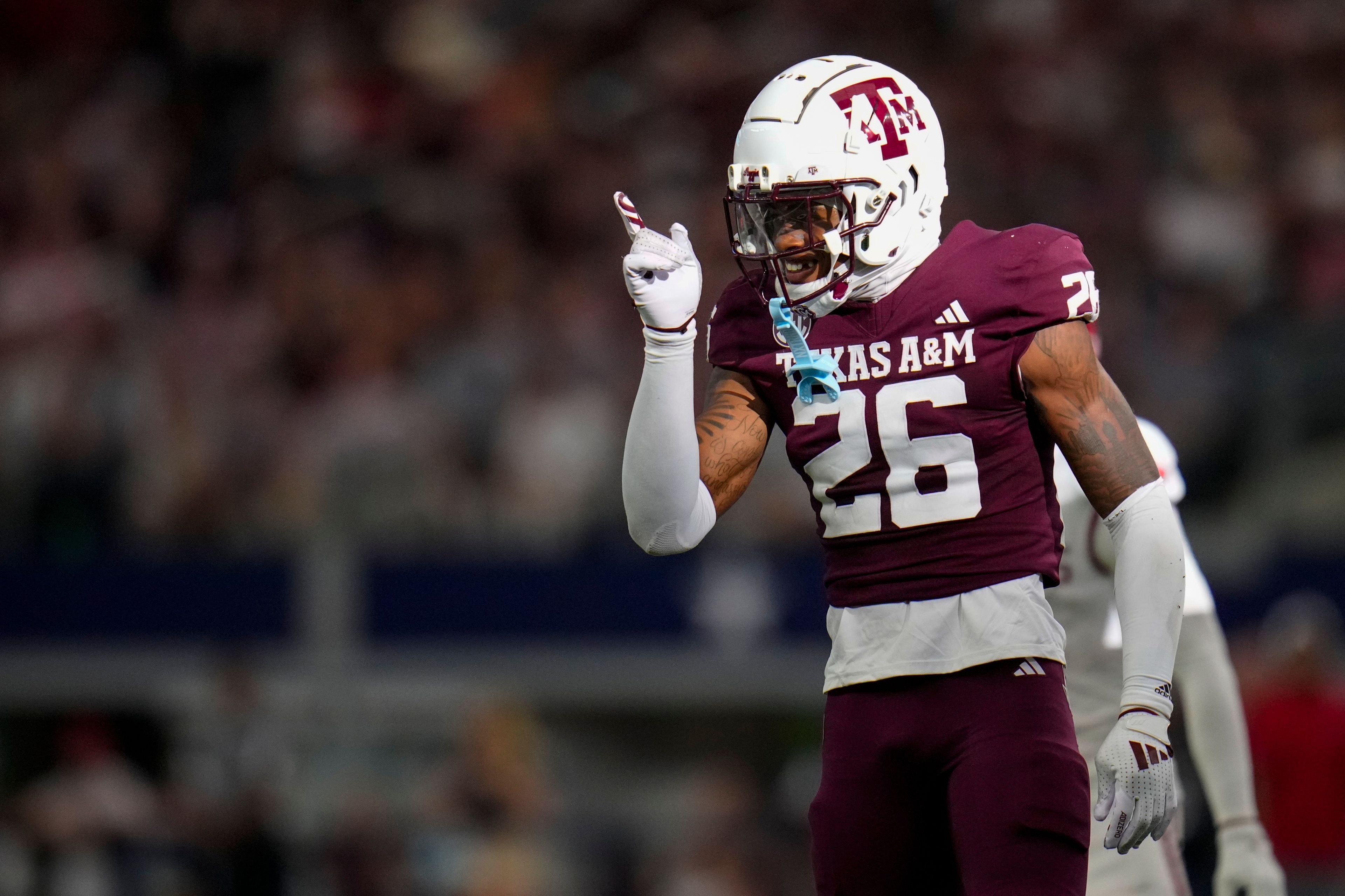 Texas A&M defensive back Will Lee III reacts after a play against Arkansas during the second half of an NCAA college football game, Saturday, Sept. 28, 2024, in Arlington, Texas. Texas A&M won 21-17. (AP Photo/Julio Cortez)