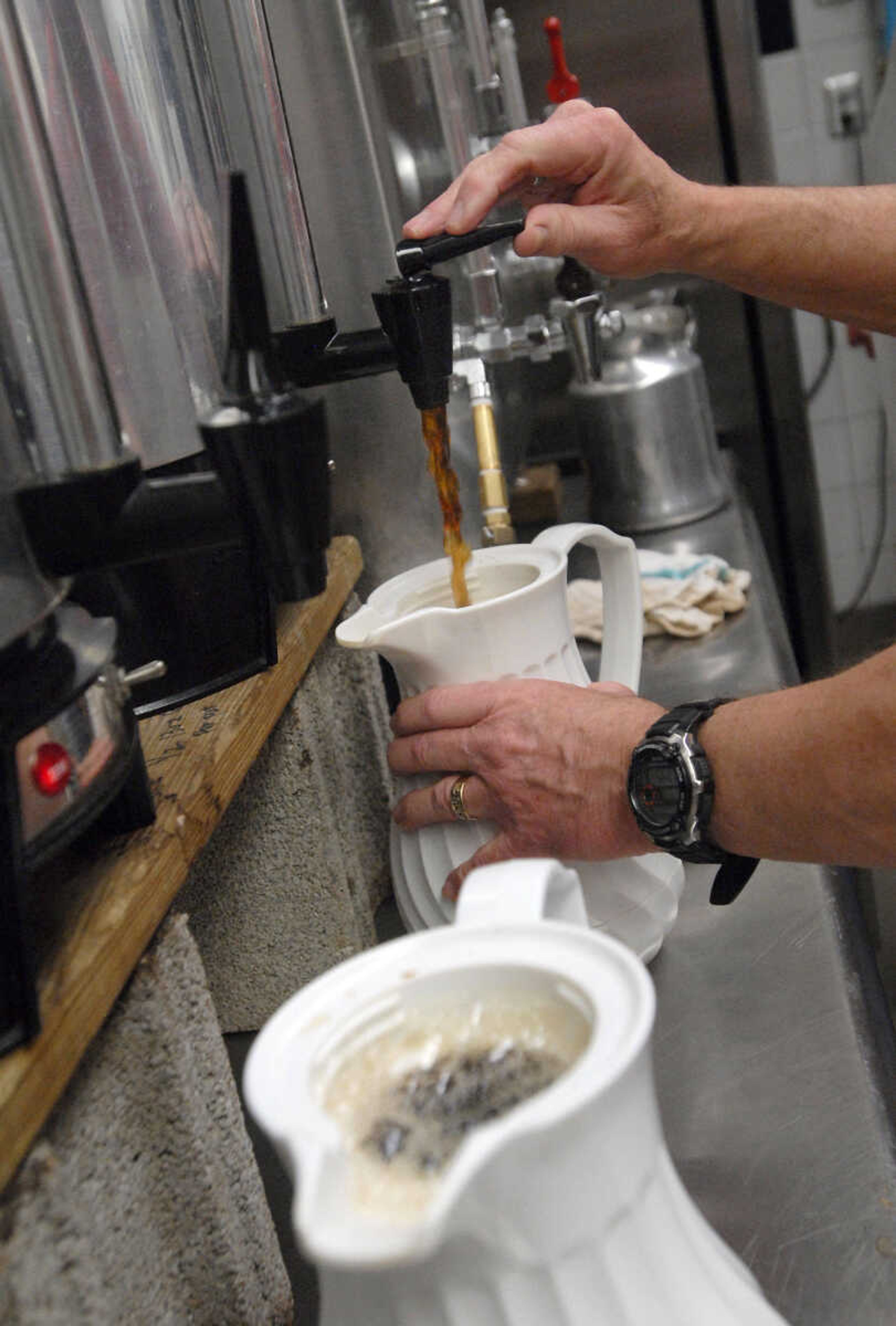 KRISTIN EBERTS ~ keberts@semissourian.com

Paul Short does his duty as "brewmeister" to refill the coffee pitchers during the 73rd annual Pancake Day put on by the Cape Lions Club at the A.C. Brase Arena on Wednesday, March 23, 2011, in Cape Girardeau. More than 10,000 pancakes and 700 pounds of sausage were served.