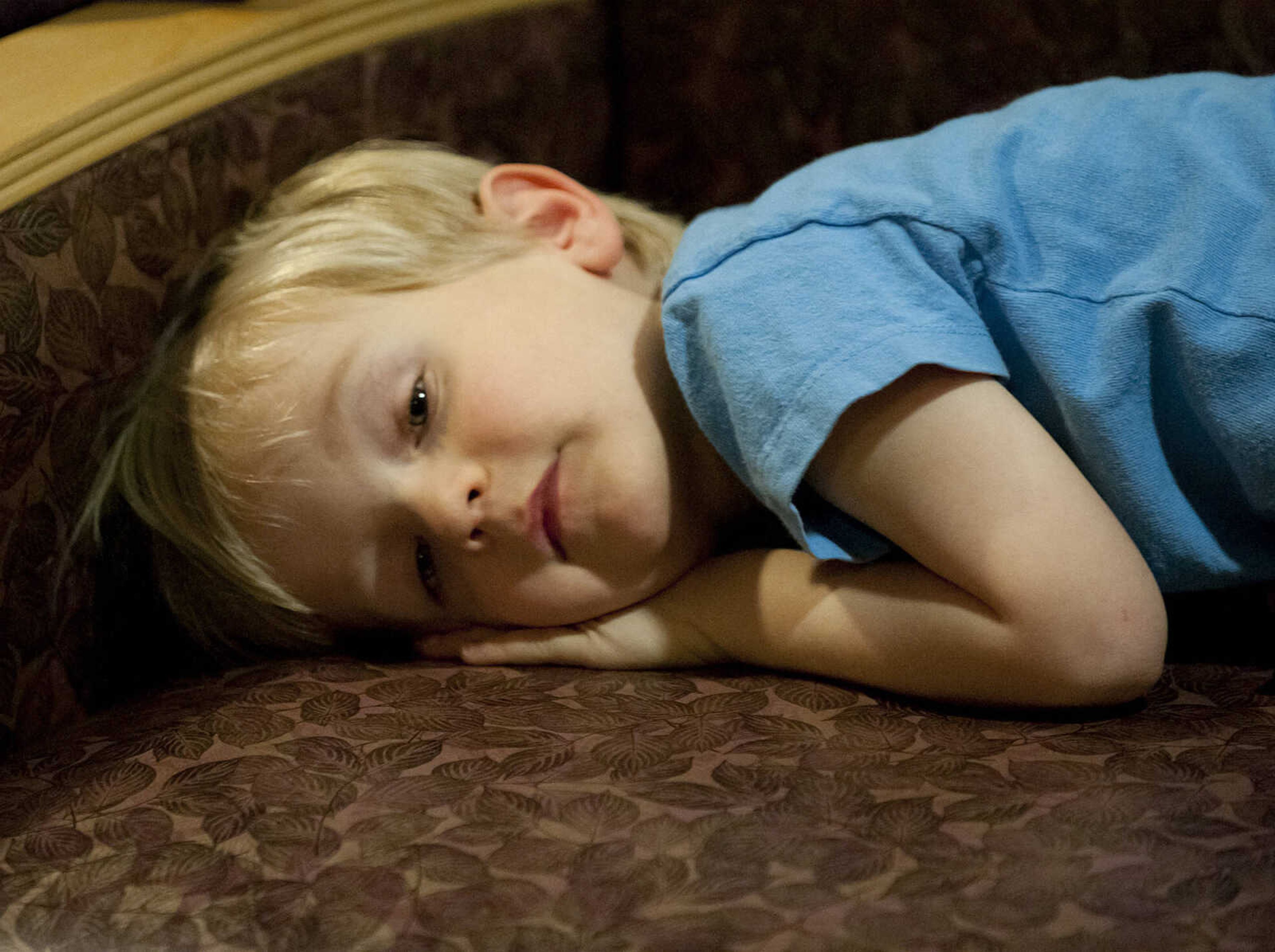 Chase Henley, 3, lays on the couch, Wednesday, Jan. 1, in his mother's room at Southeast Hospital. Chase's brother Tucker was born at 12:59 a.m. Wednesday, Jan. 1.