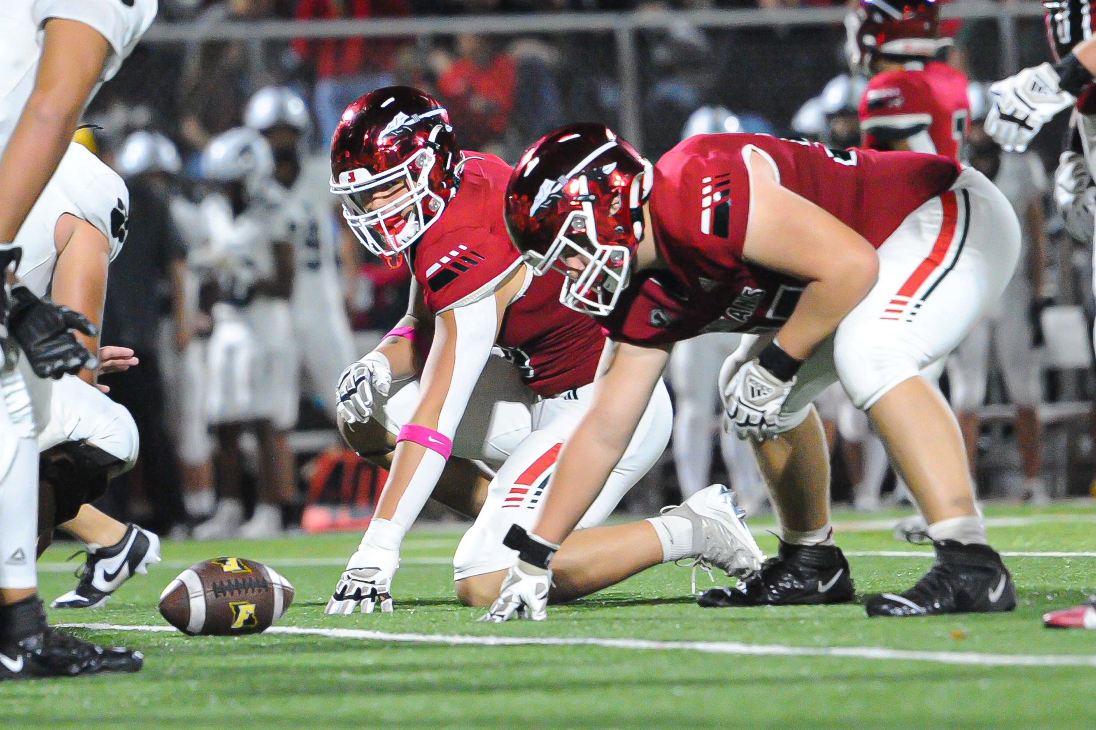 Jackson defensive linemen line up during a Friday, October 25, 2024 game between the Jackson Indians and the Festus Tigers at "The Pit" in Jackson, Mo. Jackson defeated Festus, 43-7.