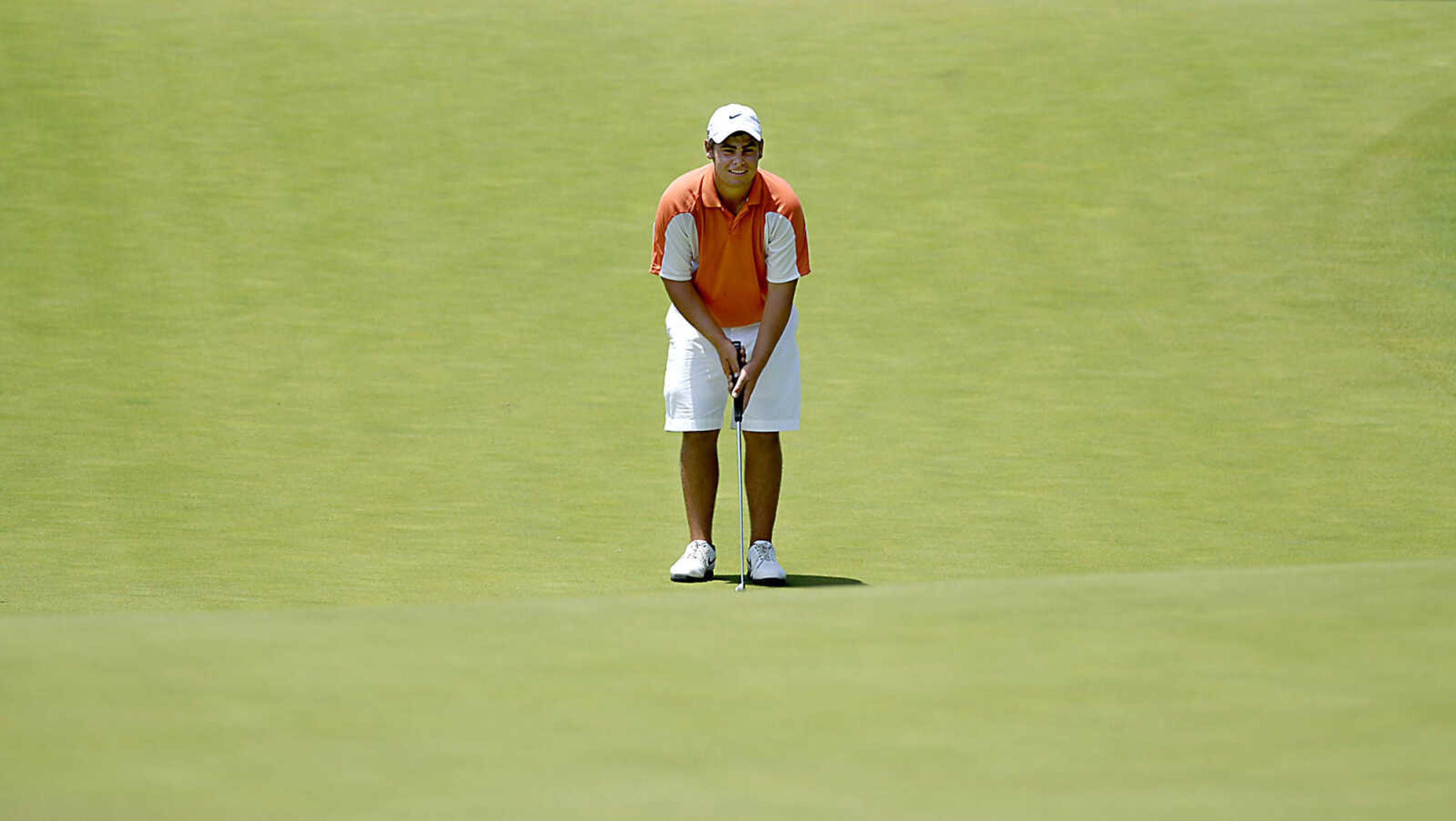 KIT DOYLE ~ kdoyle@semissourian.com
Blake Biddle laughs about an especially long putt on the 18th green Friday, July 3, 2009, in the AJGA Rolex Tournament of Champions at Dalhousie Golf Club.