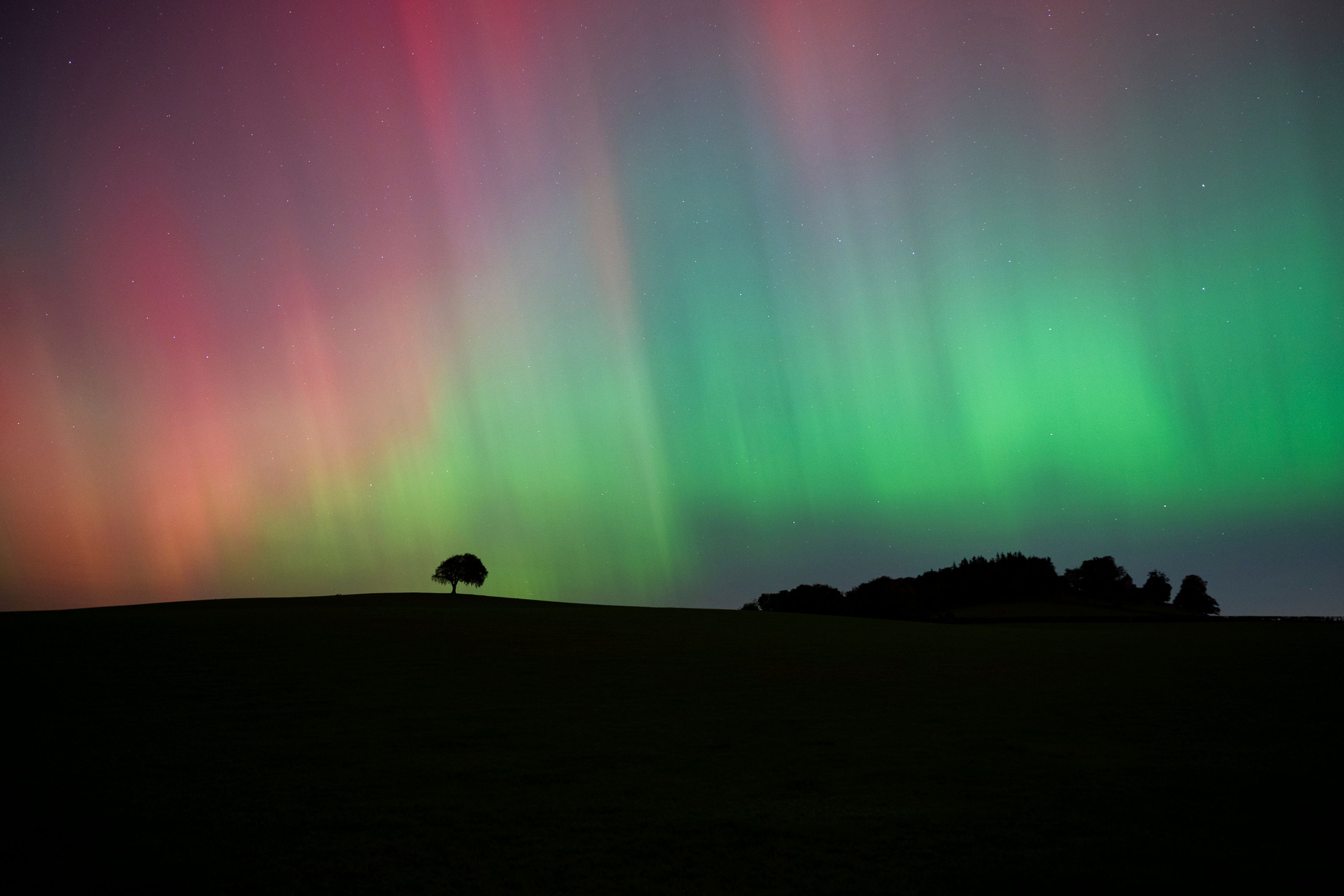 The Northern Lights, also known as the Aurora Borealis, are seen in the sky near Knaresborough, England, Friday, Oct. 11, 2024. (Andrew Hawkes via AP)