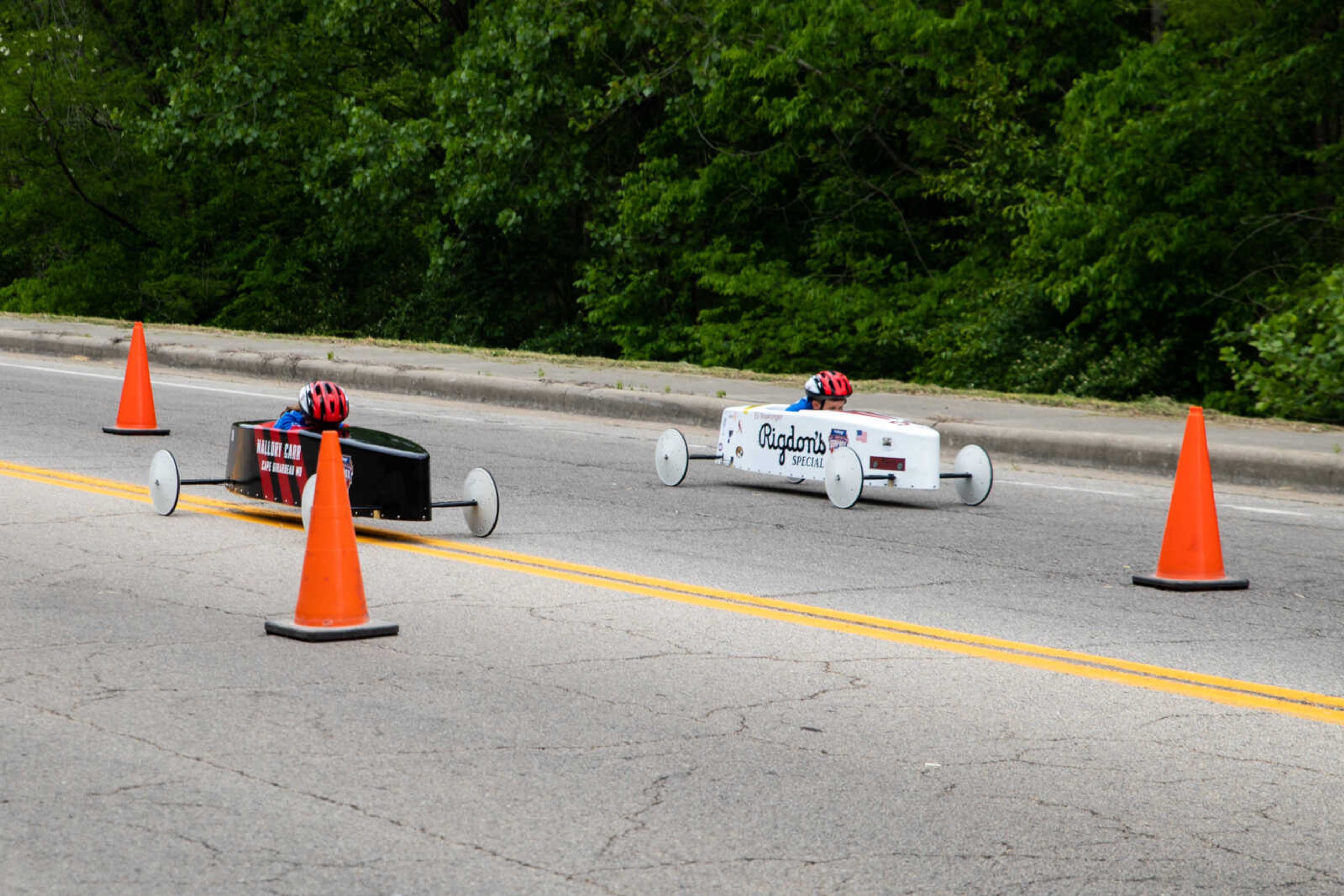 Mallory Carr and Eli Niswonger, both 7-years-old, race in the Soap Box Derby on Saturday, May 6 at Blanchard Elementary School.