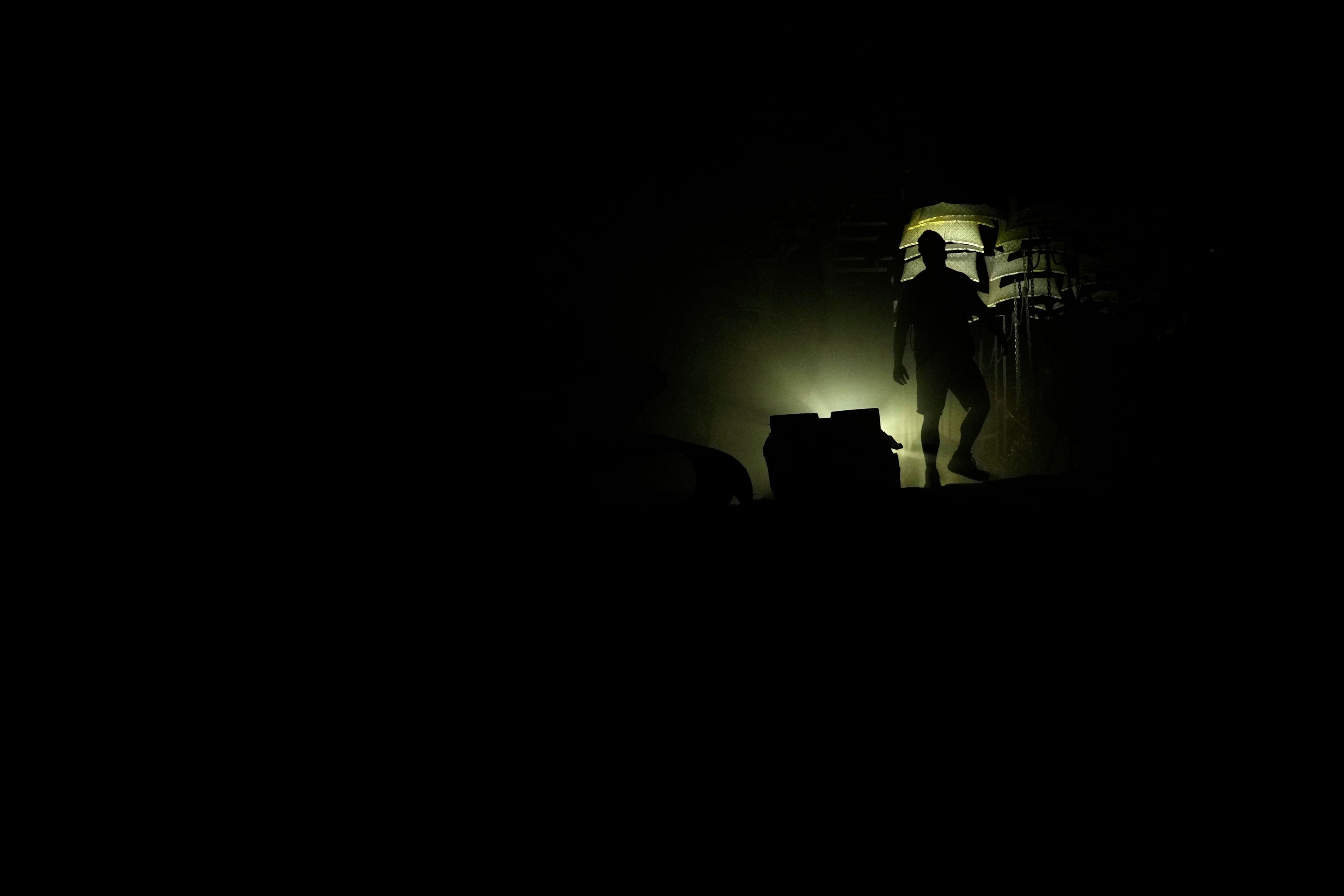 A miner walks in a shaft of the CSM coal mine in Stonava, Czech Republic, Monday, Oct. 14, 2024. (AP Photo/Petr David Josek)