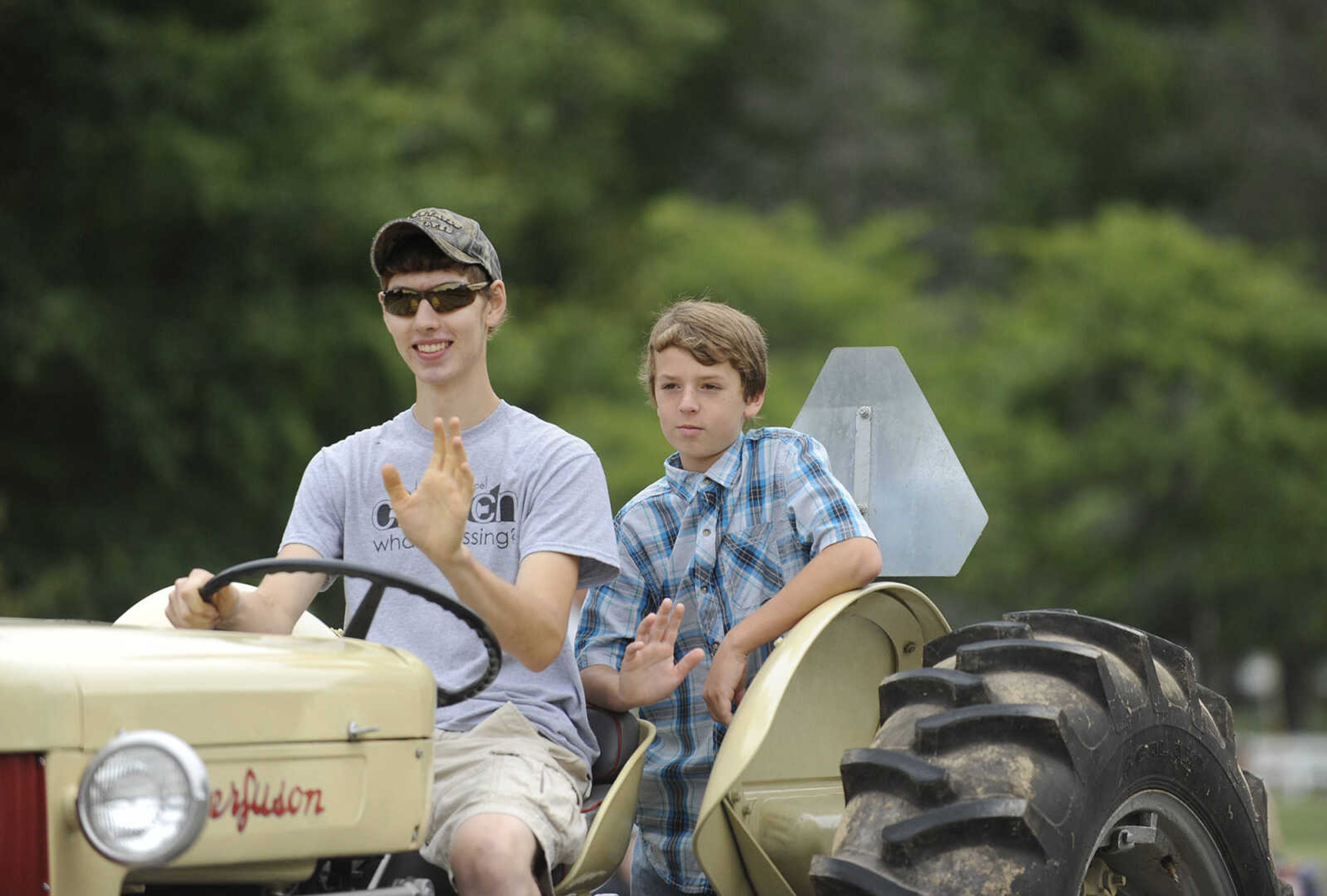 GLENN LANDBERG ~ glandberg@semissourian.com

The SEMO District Fair Parade heads down Broadway after starting in Capaha Park Saturday morning, Sept. 6, 2014, in Cape Girardeau. The parade ended at Arena Park where the 159th annual SEMO District Fair is being held.