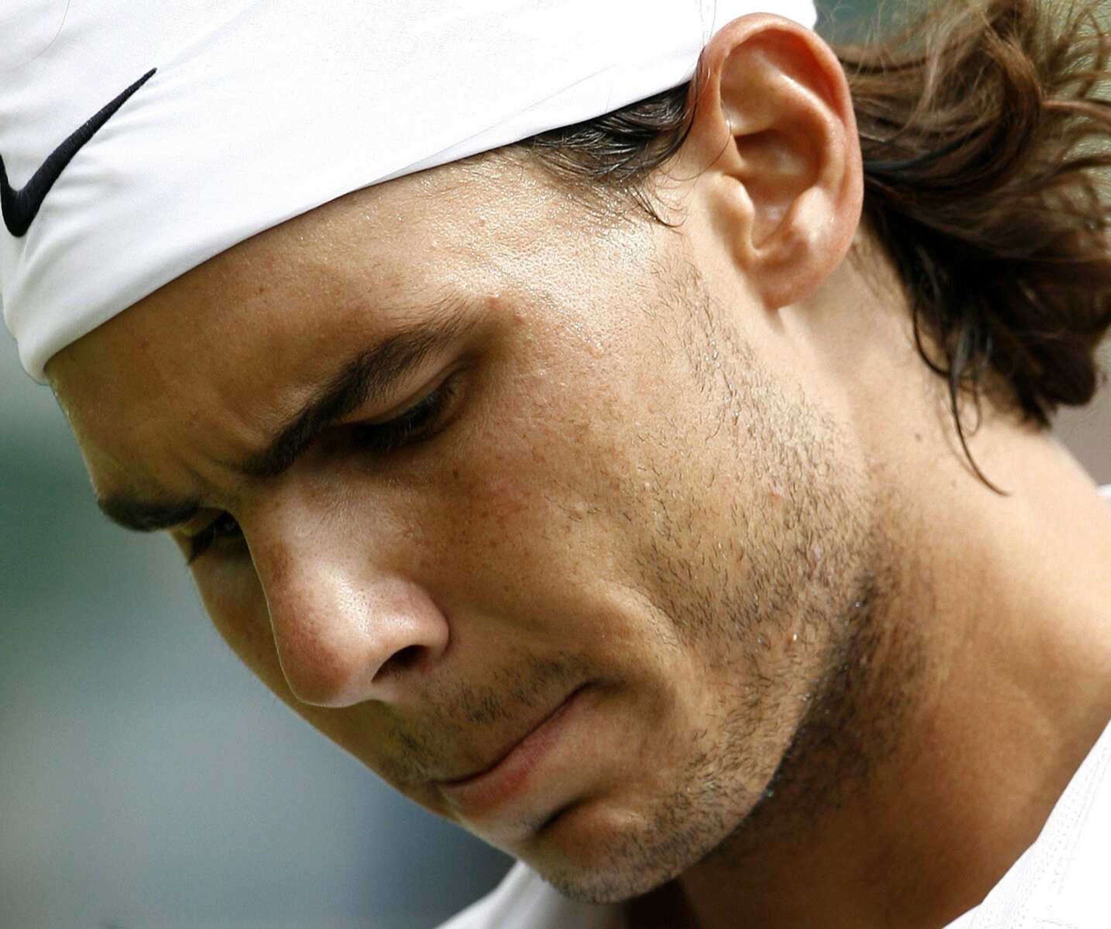 Rafael Nadal reacts during an exhibition match Friday against Stanislas Wawrinka in London. (Akira Suemori ~ Associated Press)