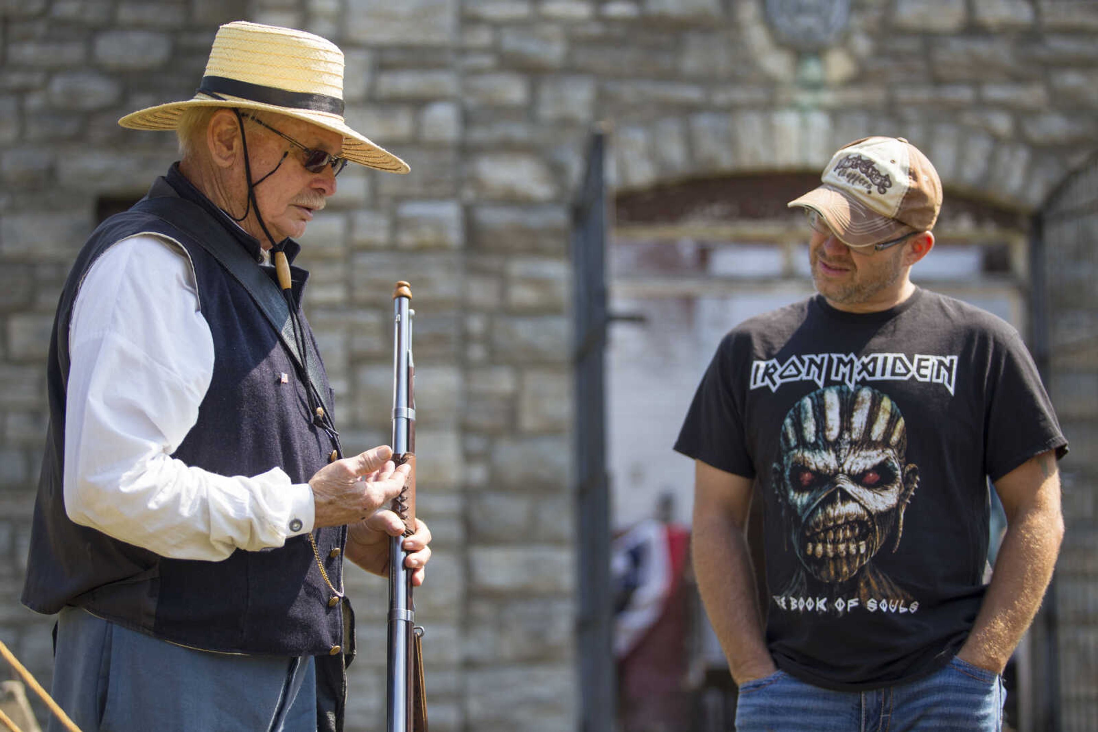 Civil War reenactor Jerry Kasten discusses the Civil War era with guests during a living history demonstration Sept. 4, 2017, at Fort D Historic Site in Cape Girardeau, Missouri.