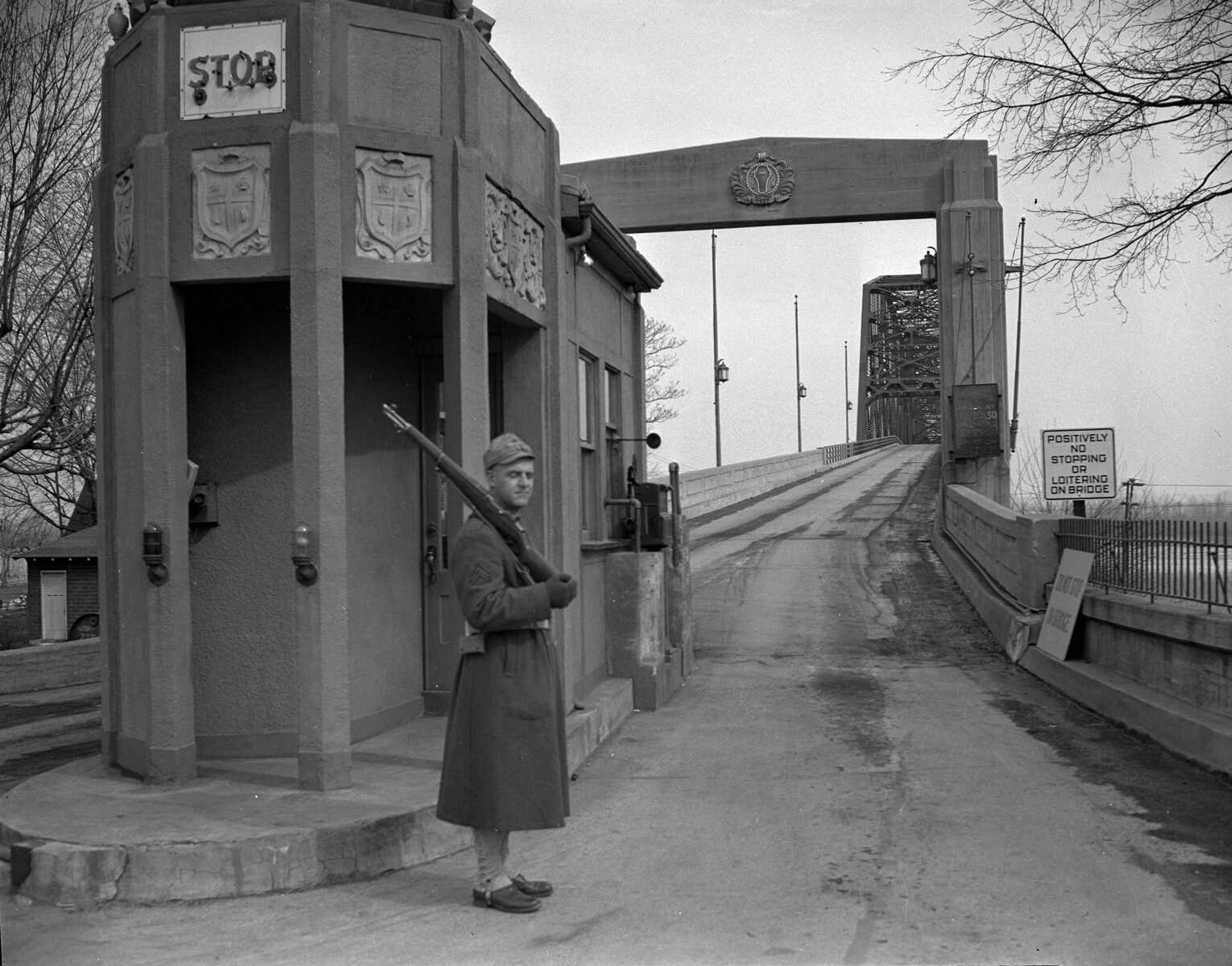 Shortly after the attack on Pearl Harbor, guards were stationed at bridges across the Mississippi River, including the traffic bridge at Cape Girardeau. By Feb. 21, 1942, when this photo was made, Army regulars from Fort Custer, Mich., had taken over guard duty here. Soldier is Cpl. K. McGrath of Chicago.
(Photo by G.D. Fronabarger, Cape Girardeau Southeast Missourian)