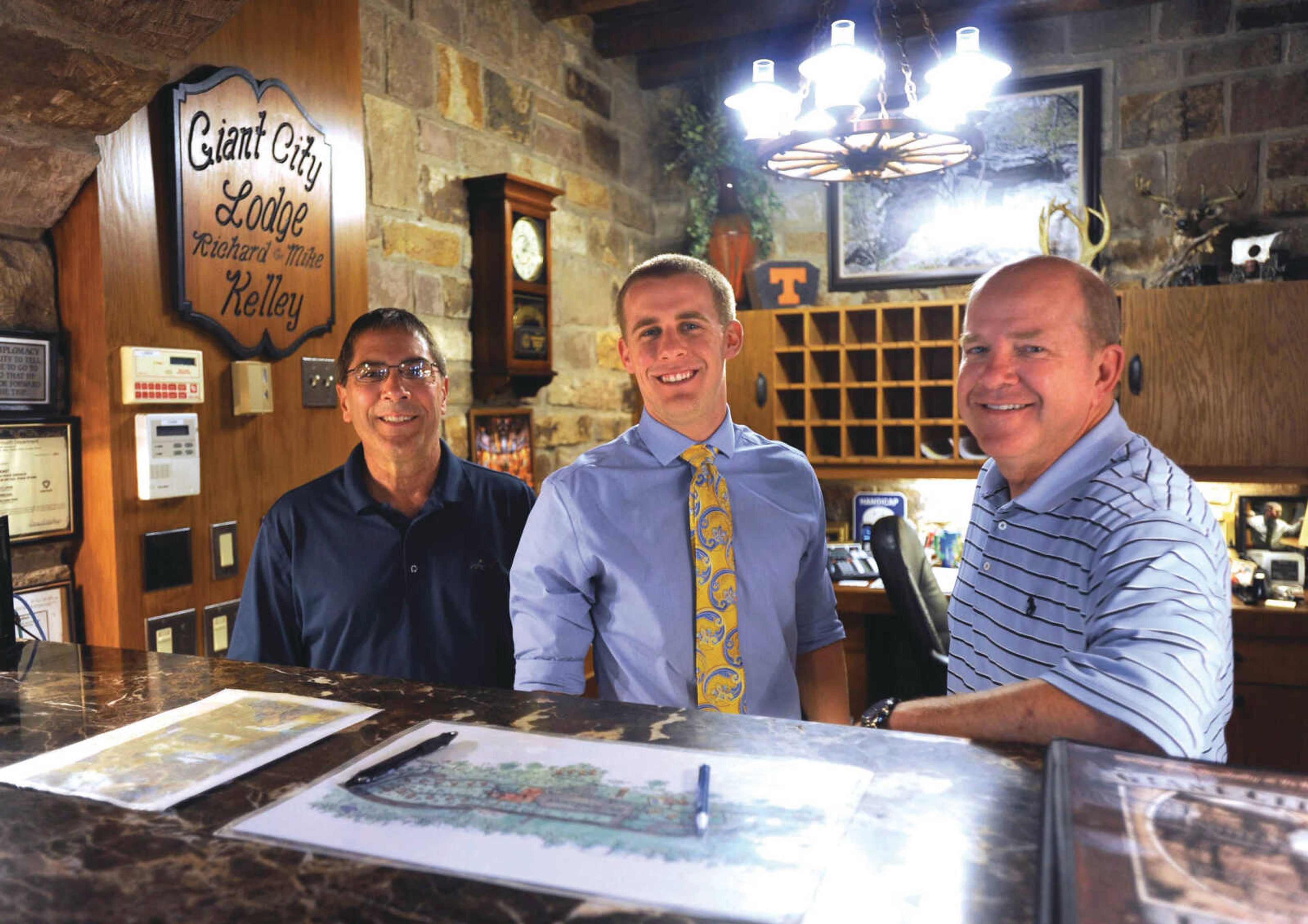 Headline Bold:Giant City Lodge managers Jim Booziotis, left, Mikey Kelley and Mike Kelley pose for a photo Sept. 8 in Makanda, Illinois.