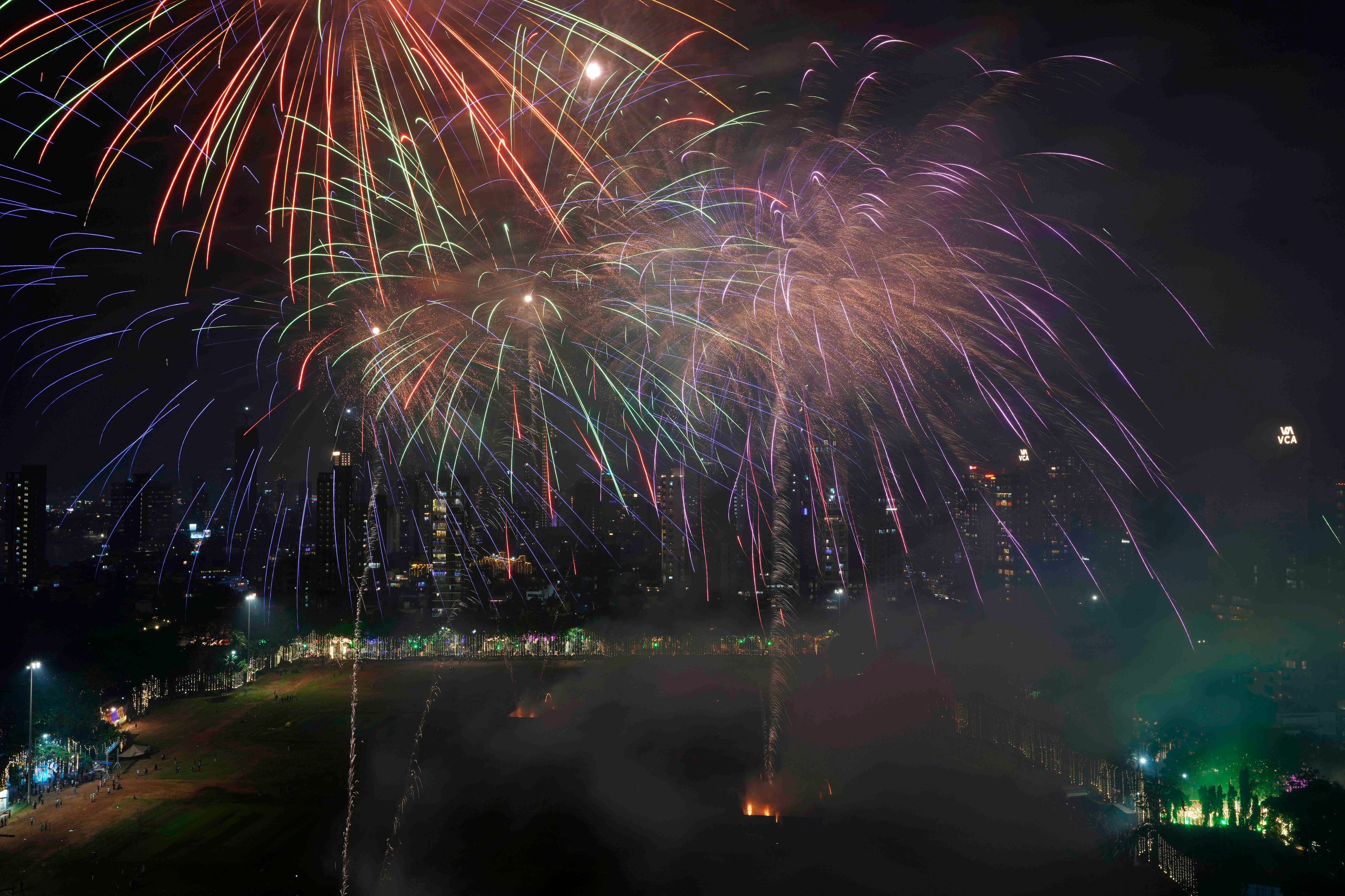 Fire crackers and smoke fill the city skyline as a part of Diwali celebrations at Shivaji Park in Mumbai, India, Wednesday, Oct. 30, 2024.(AP Photo/Rajanish Kakade)