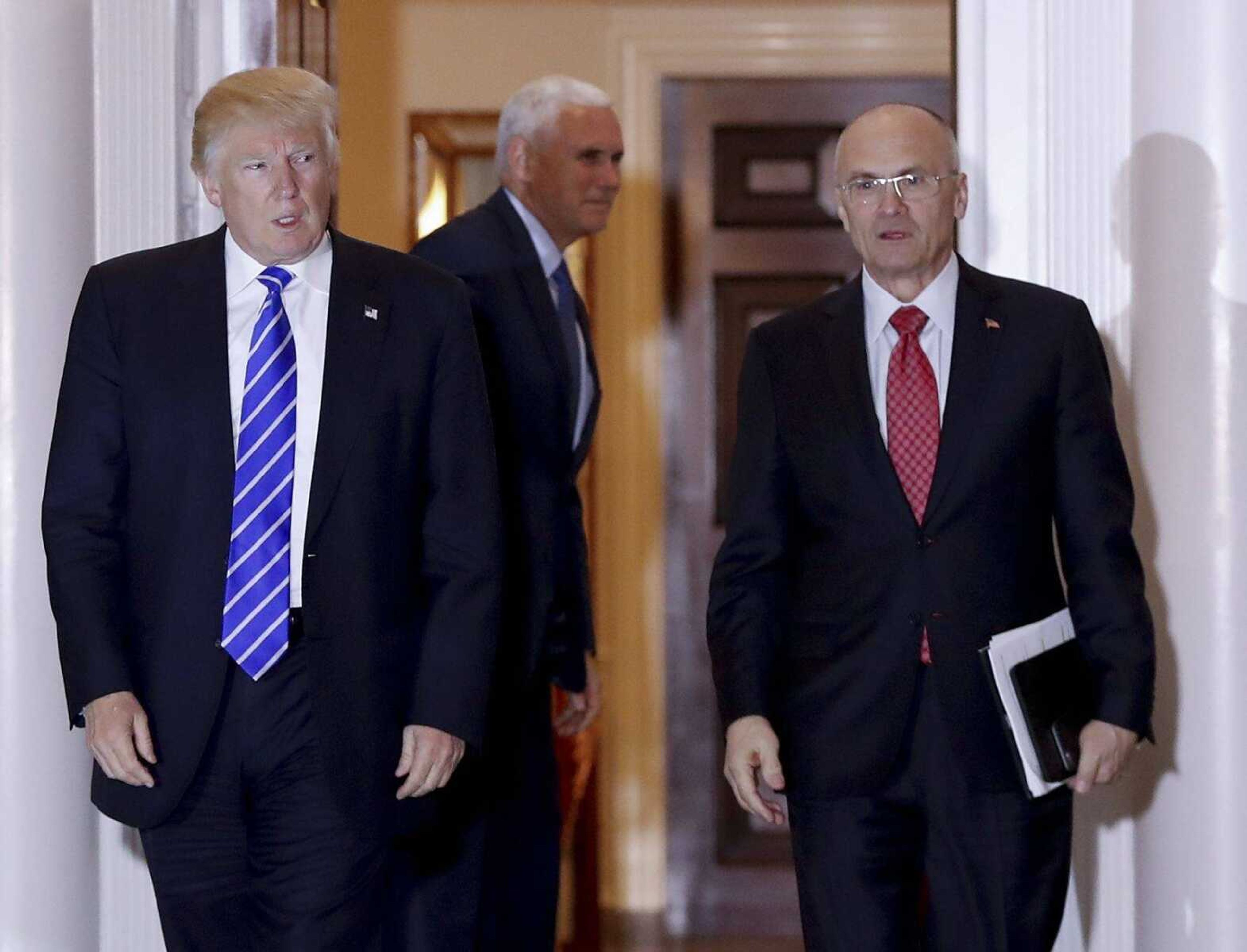 Andy Puzder, right, and President Donald Trump