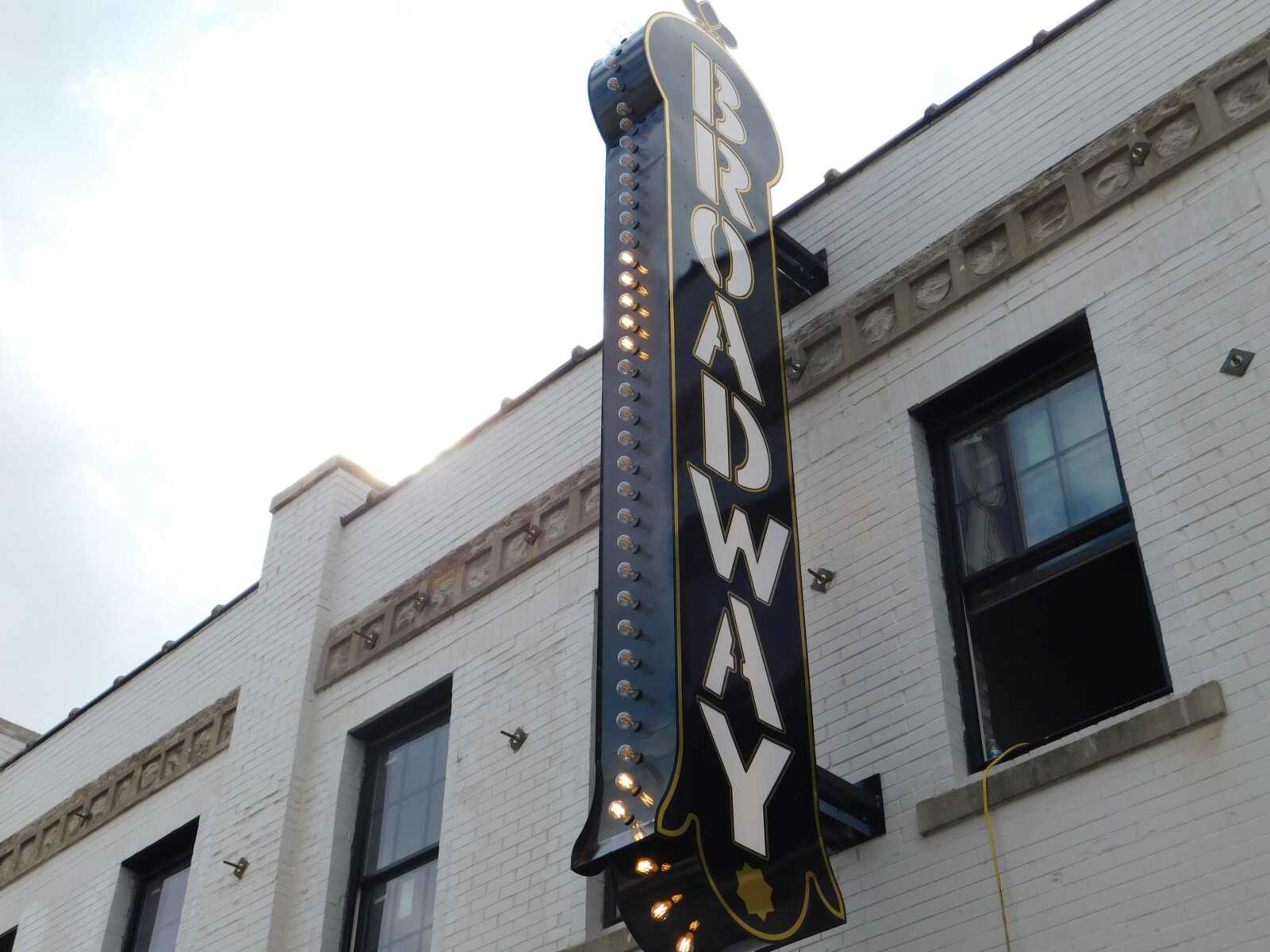 The new marquee for the redeveloped Broadway Theatre building in downtown Cape Girardeau was designed to resemble the previous sign there. It was revealed in front of several dozen onlookers at an unveiling ceremony Wednesday, March 13.