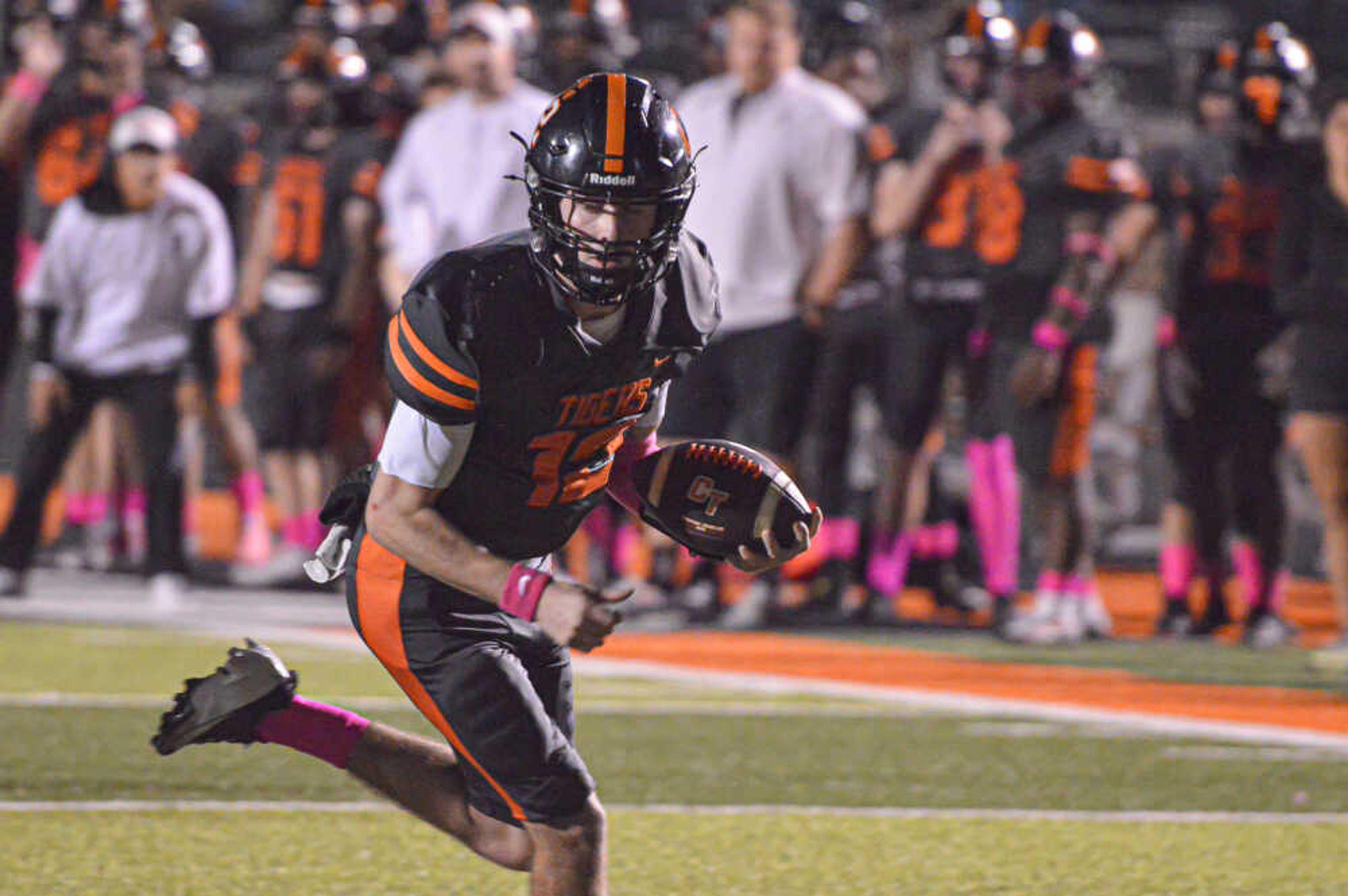 Cape Central quarterback Deklin Pittman scampers into the end zone for a rushing touchdown against Kennett on Friday, Oct. 25, at Tigers Stadium in Cape Girardeau.