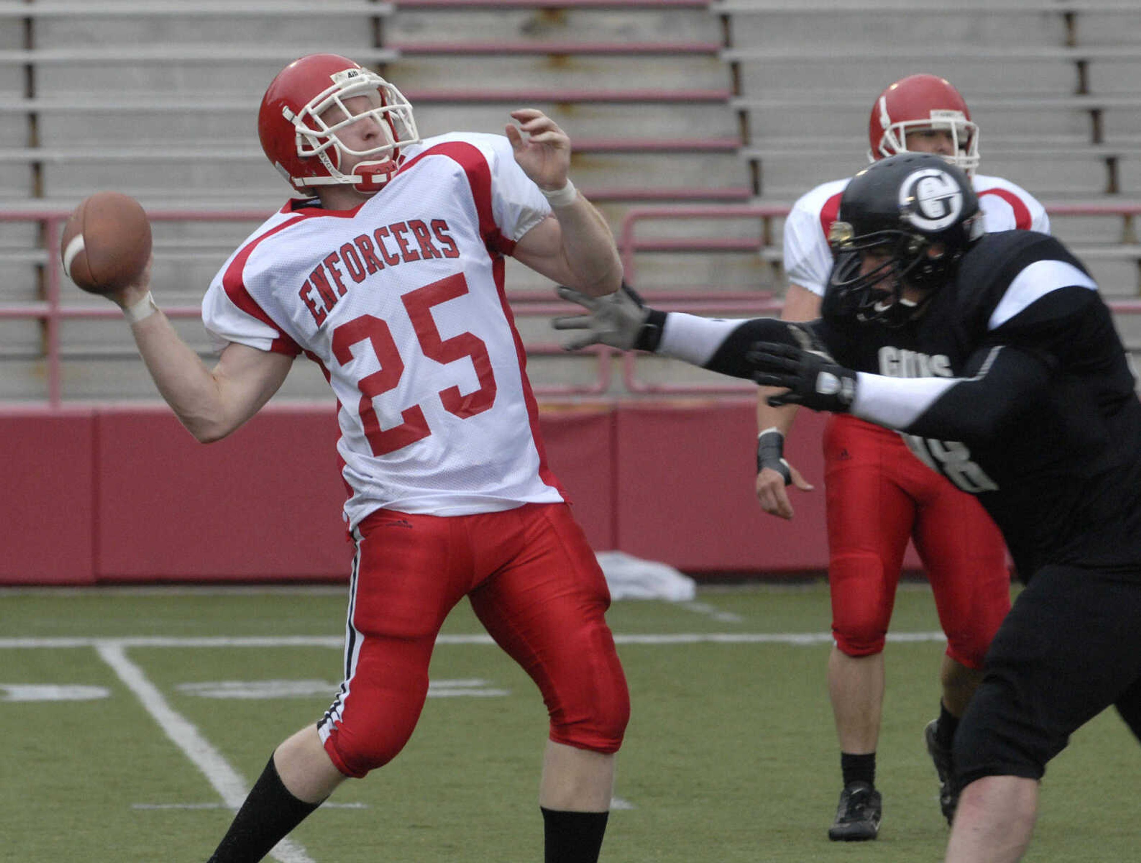 Cape County Enforcers quarterback Cody Farrow passes against the Springfield Guns.