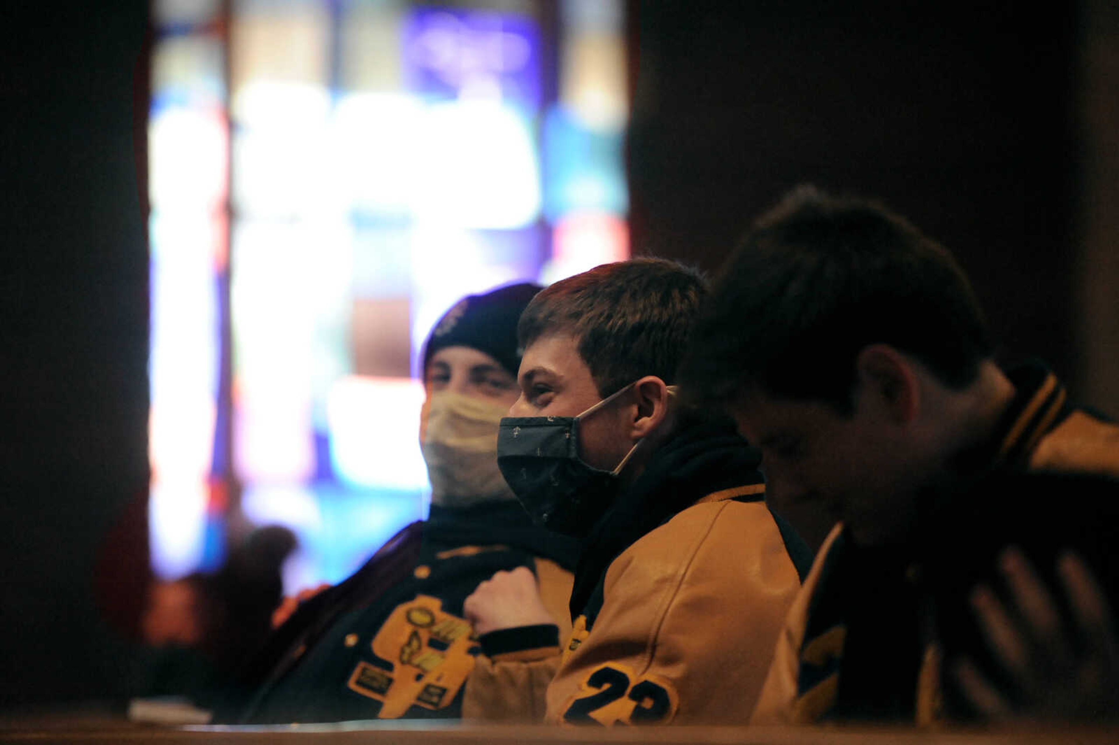 High school boys from St. Vincent Valley sit next to each other in the pews at the St. Vincent DePaul parish in Perryville, Missouri, during Friday's keynote address of the March for Life Day event.