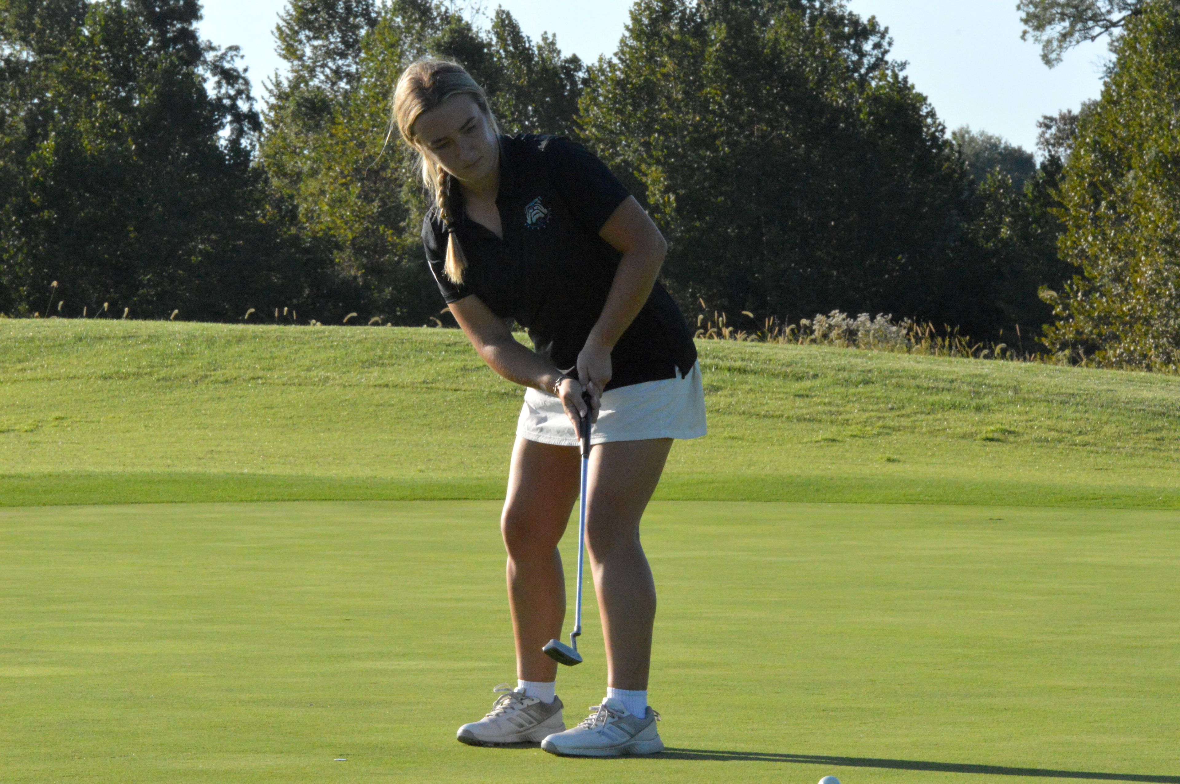 Notre Dame senior Silvia Schallberger putts during the quad-meet on Senior Night on Thursday, Sept. 26. Schallberger finished in third place with a score of 41.