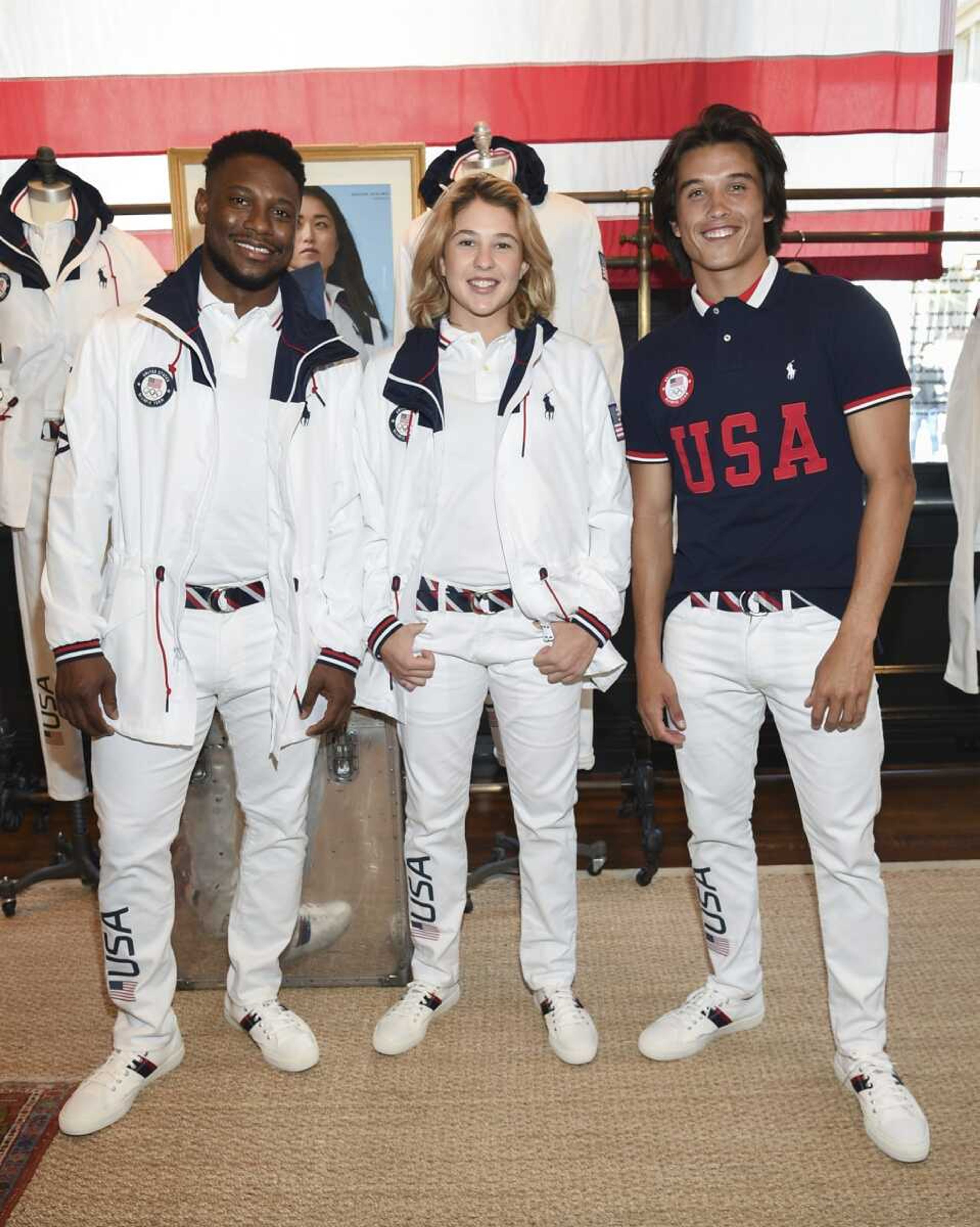 Athletes Daryl Homer (fencing), left, Jordyn Barratt (skateboard) and Heimana Reynolds (skateboard) participate in the Team USA Tokyo Olympic closing ceremony uniform unveiling Tuesday at the Ralph Lauren SoHo Store in New York. Ralph Lauren is an official outfitter of the 2021 U.S. Olympic Team.