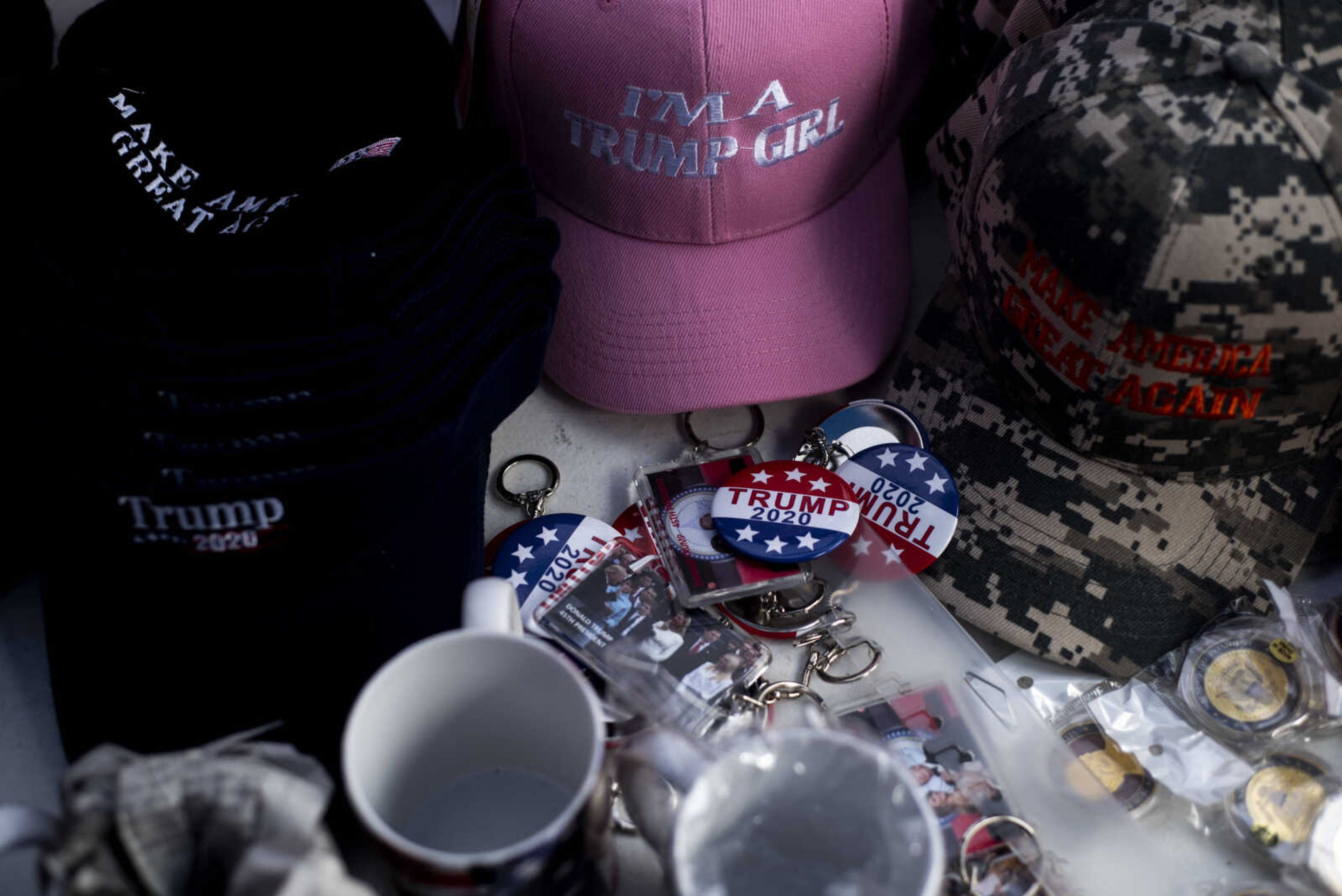 Merchandise sits on a table for sale at a merchandise booth near West Park Mall Monday, Nov. 5, 2018, in Cape Girardeau.