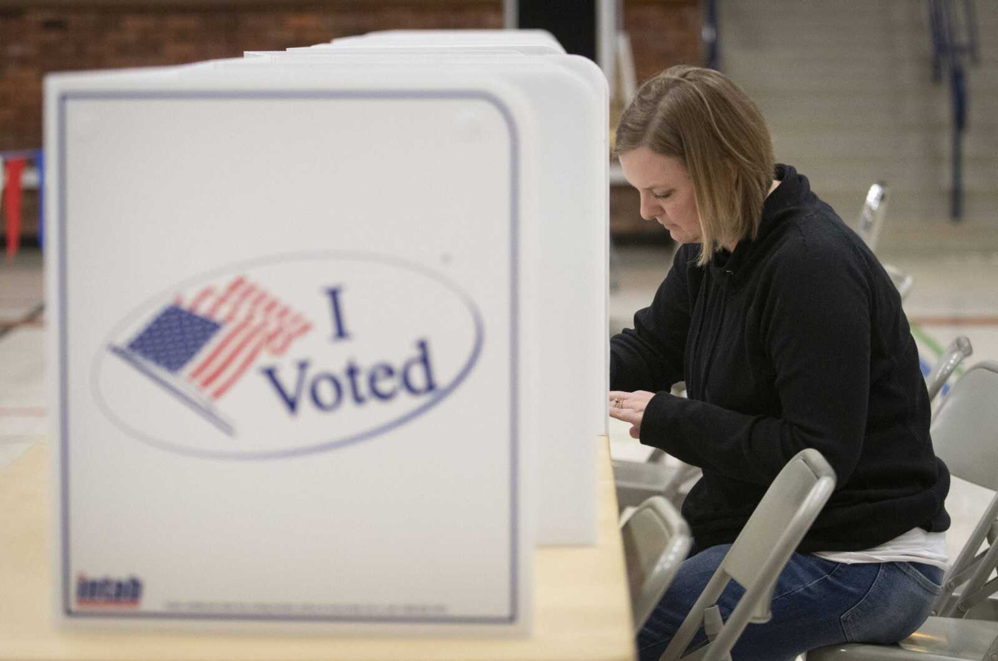 Jeni Powers of Cape Girardeau votes on election day Tuesday at Arena Building in Cape Girardeau.