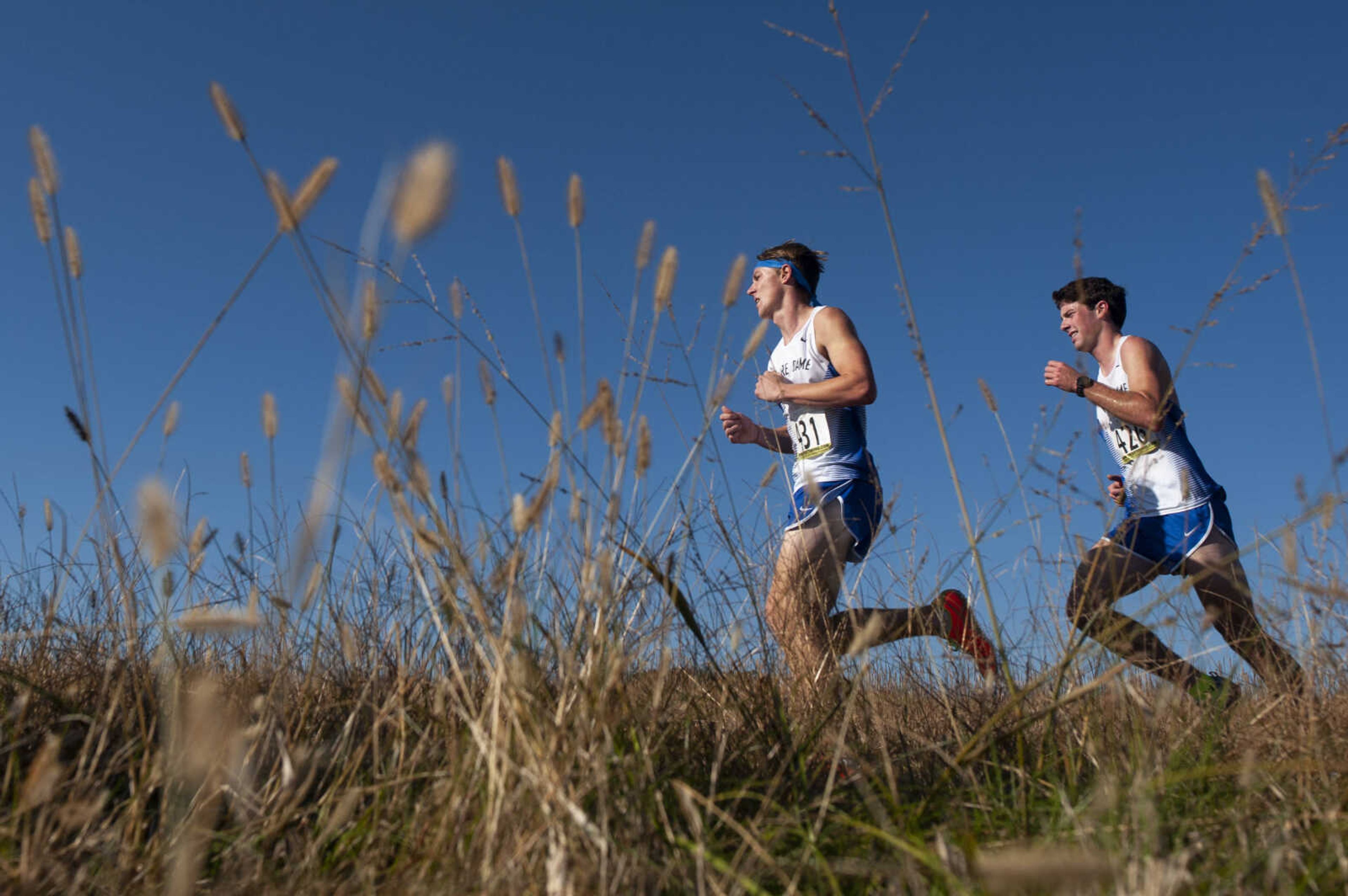 Notre Dame sophomore Malcolm Patton, in front, and senior Clayton Eftink run in the Class 3 District 1 cross country championship Saturday, Nov. 2, 2019, at Notre Dame Regional High School in Cape Girardeau.