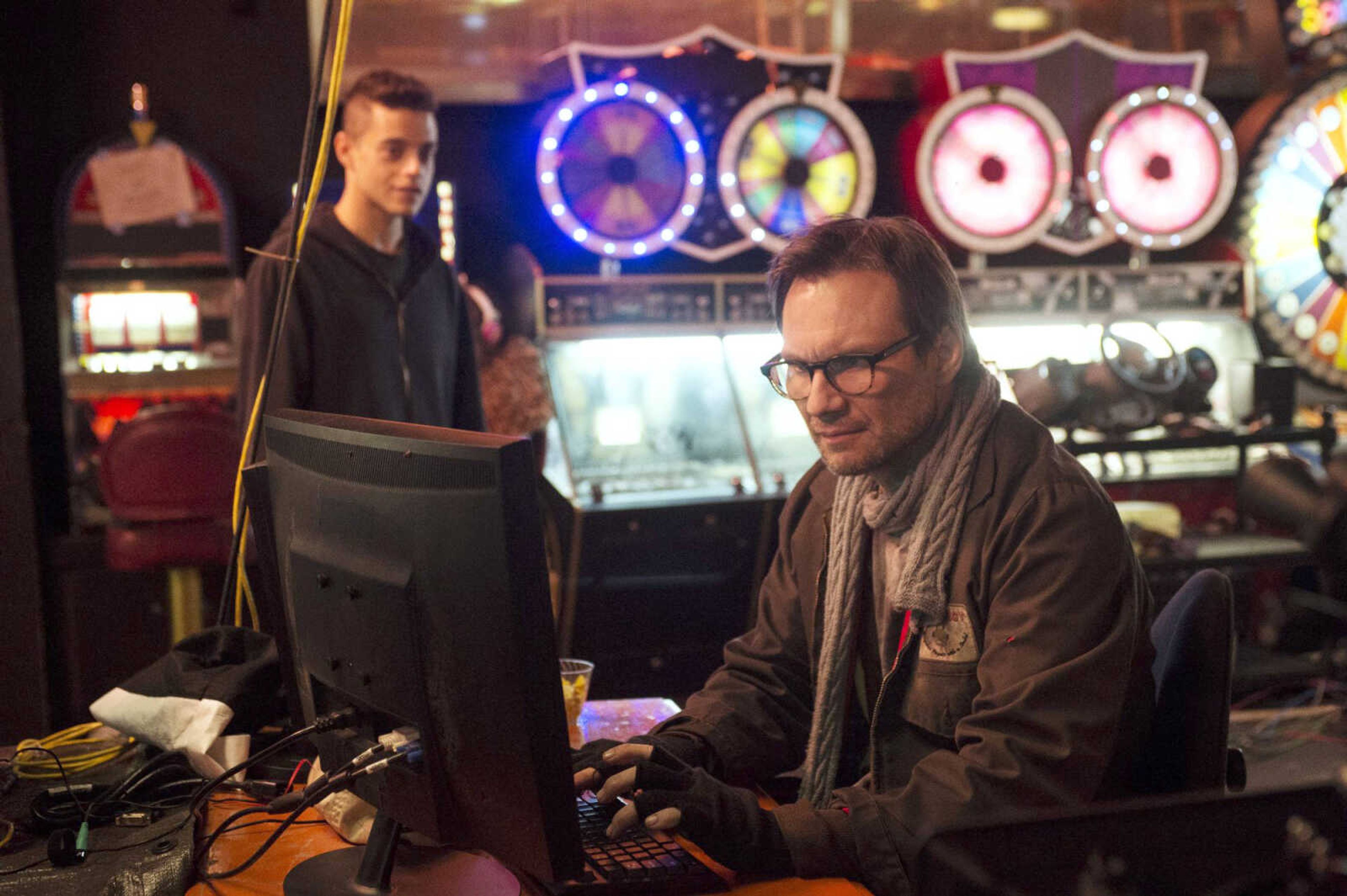 Rami Malek, left, as Elliot, and Christian Slater as Mr. Robot in a scene from the television series "Mr. Robot."(David Giesbrecht ~ USA Network via AP)