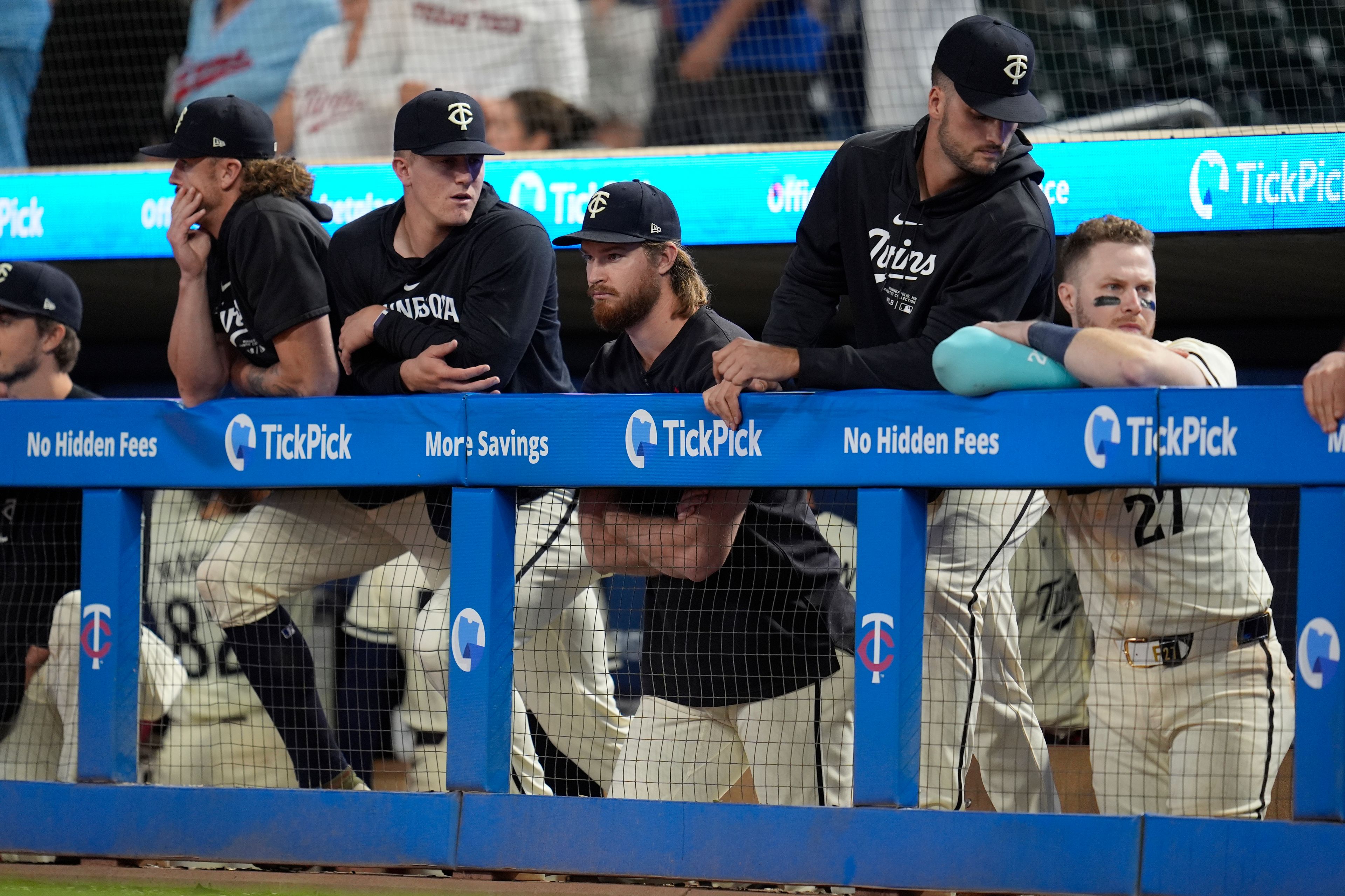 Minnesota Twins players stand in the dugout after a baseball game against the Miami Marlins, Thursday, Sept. 26, 2024, in Minneapolis. The Marlins won 8-6 in 13 innings. (AP Photo/Abbie Parr)