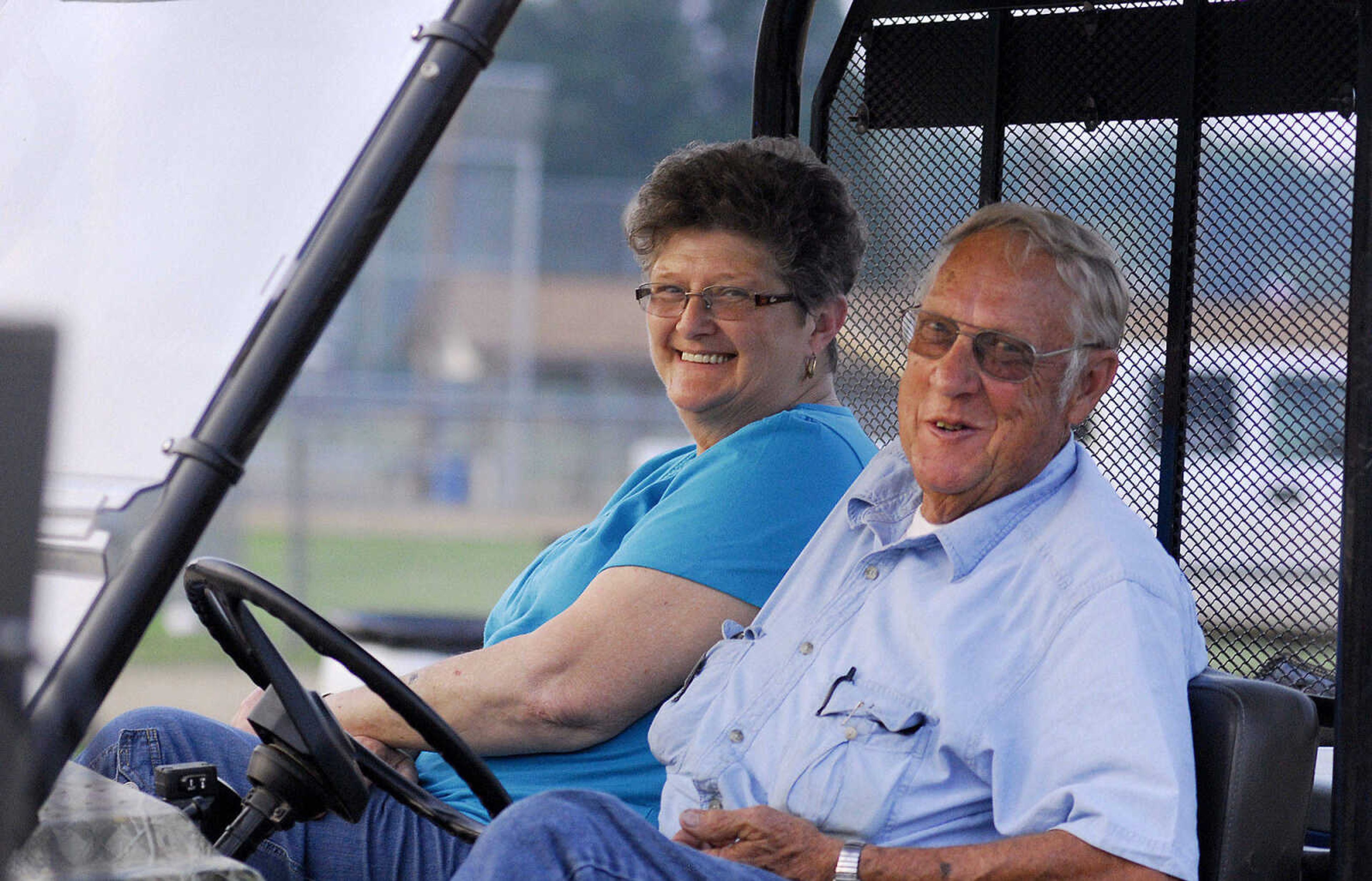 LAURA SIMON~lsimon@semissourian.com
Tommy and Nancy Littlejohn of Brownsville, TN smile for the camera as they wait for their son's turn at the tractor pull Saturday, May 29, 2010 during the "Pullin' for St. Jude" tractor and truck pull at Arena Park.