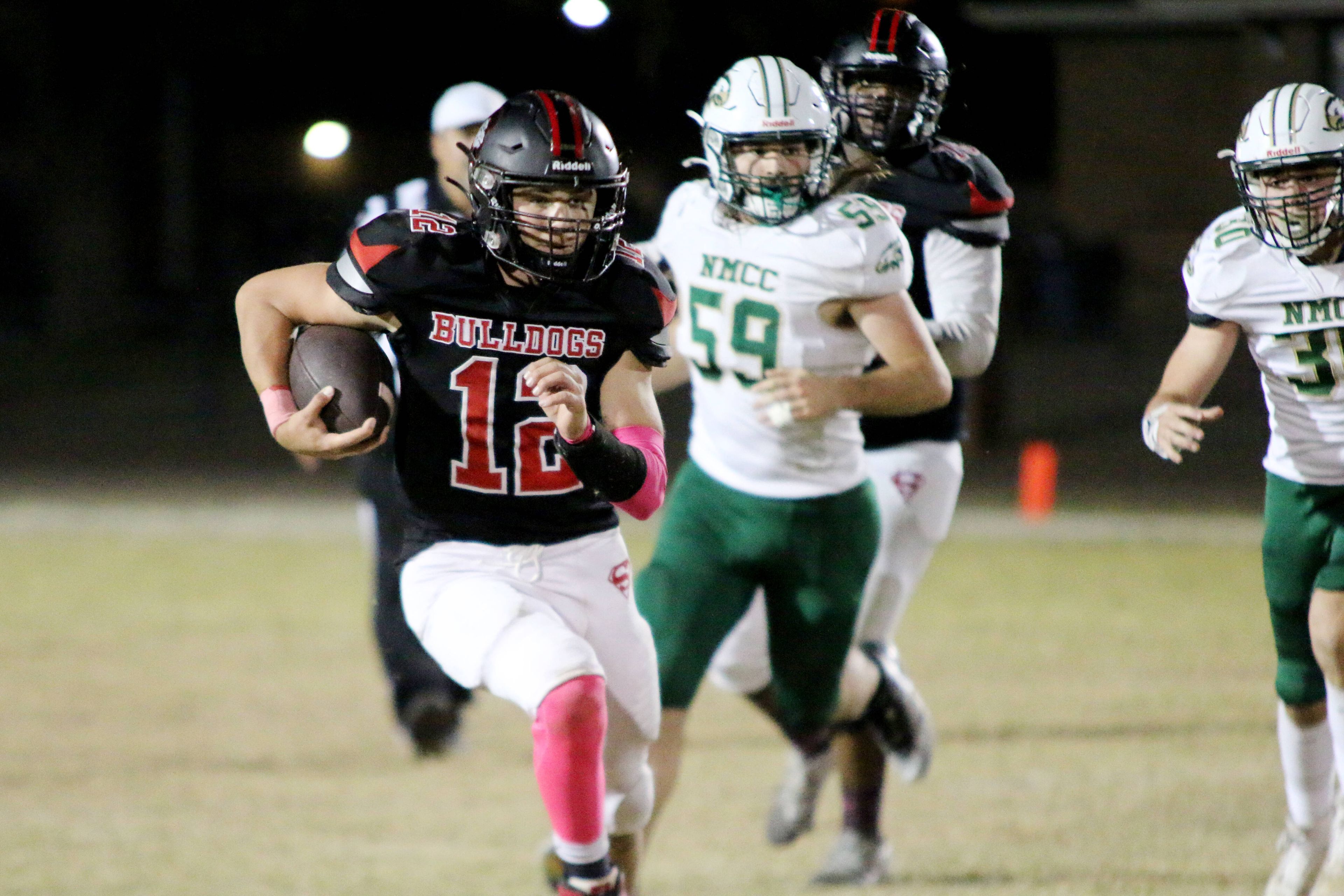 Sikeston's Pierce Baker rushes forward during a Friday, October 18, 2024 game between the Sikeston Bulldogs and the New Madrid County Central Eagles at Sikeston High School in Sikeston, Mo. Sikeston defeated NMCC, 49-21.