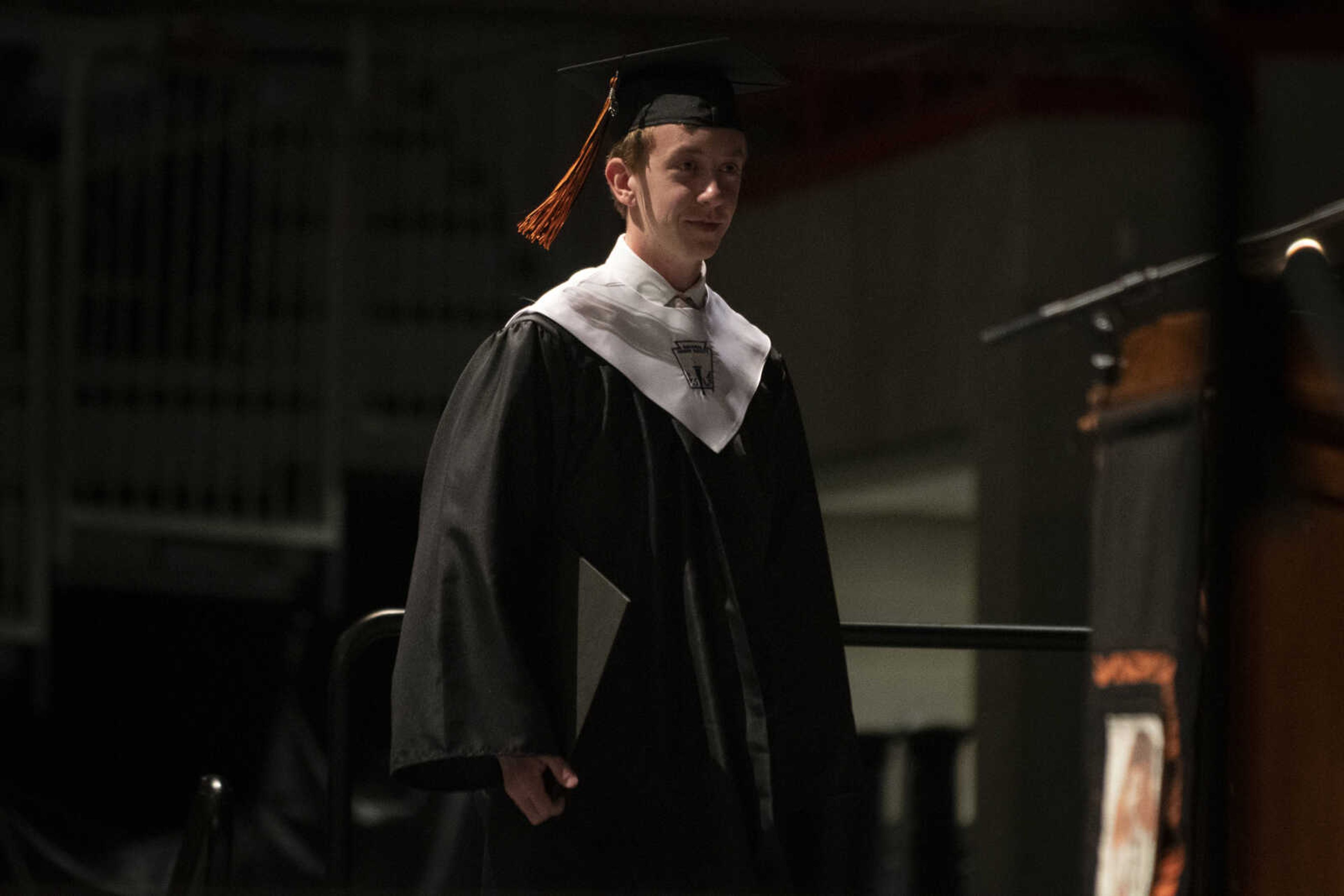 Cape Central senior class salutatorian Jeffrey Bittle walks across the stage before his speech during Cape Central High School's Class of 2019 Commencement on Sunday, May 12, 2019, at the Show Me Center in Cape Girardeau.