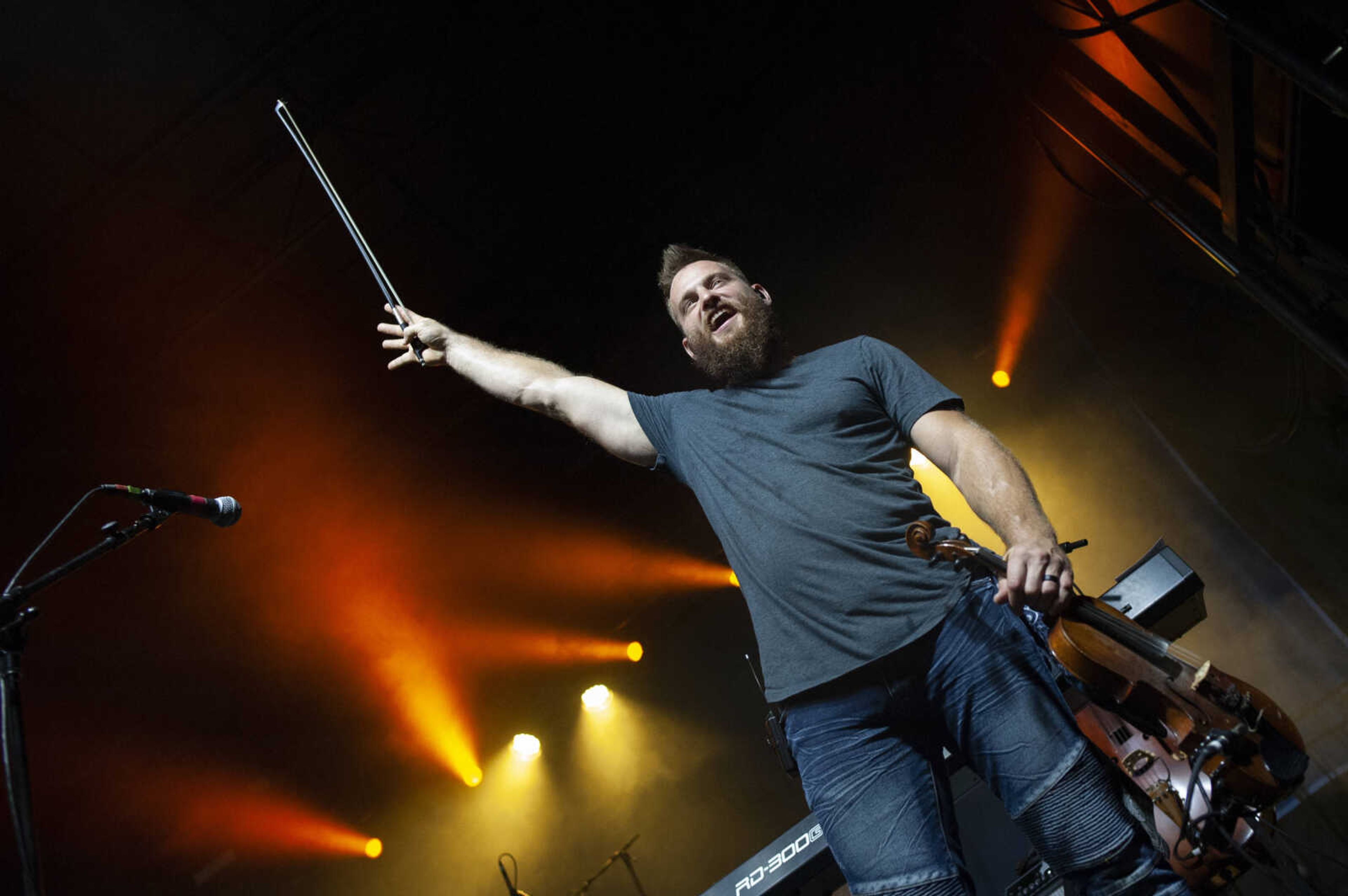 Dawson Hollow's Kyle Link waves to the crowd while on stage with the band during Shipyard Music and Culture Festival on Friday, Sept. 27, 2019, in Cape Girardeau.