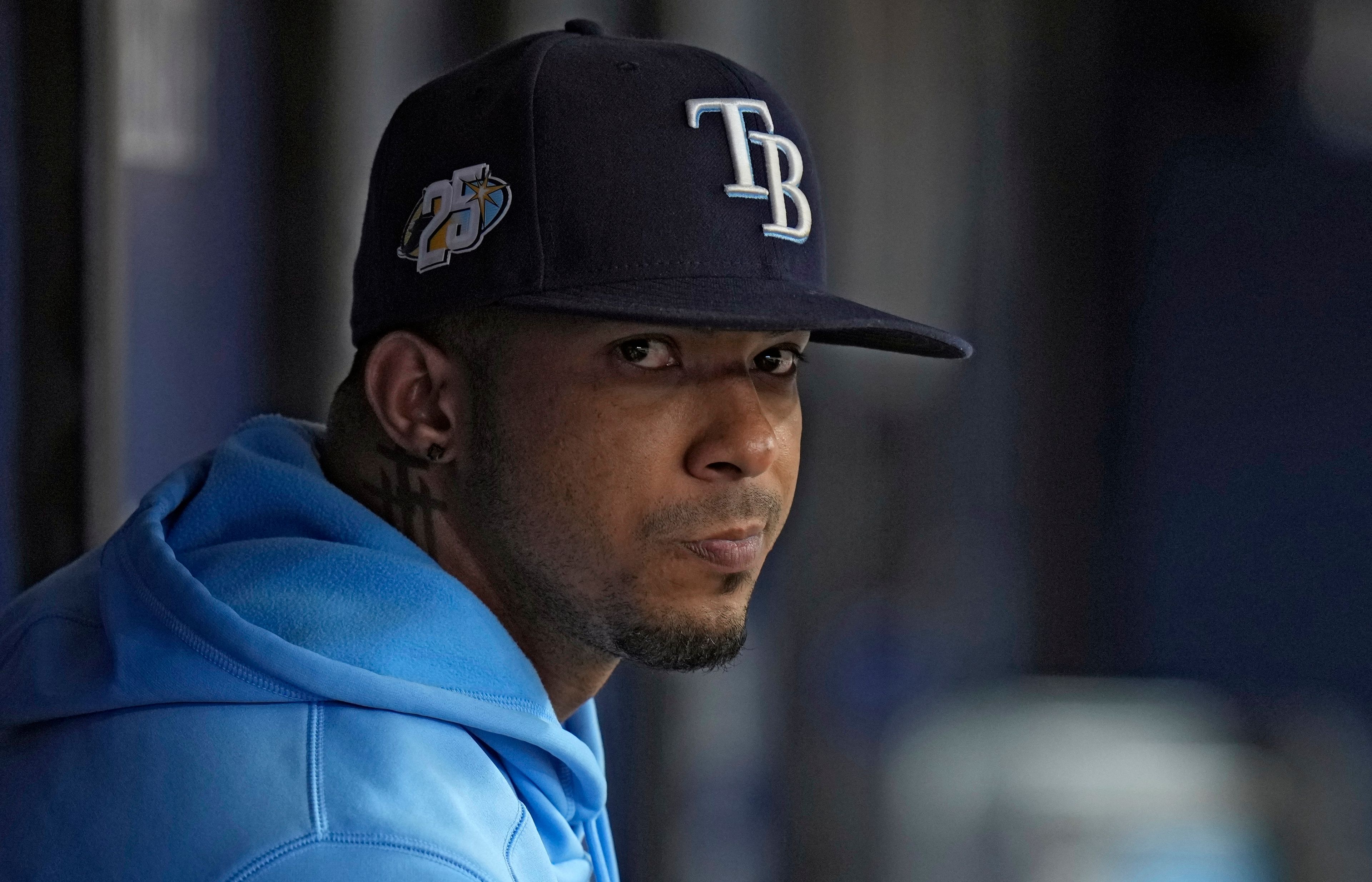 FILE - Tampa Bay Rays shortstop Wander Franco watches from the dugout during the fifth inning of a baseball game against the Cleveland Guardians Sunday, Aug. 13, 2023, in St. Petersburg, Fla. (AP Photo/Chris O'Meara, File)