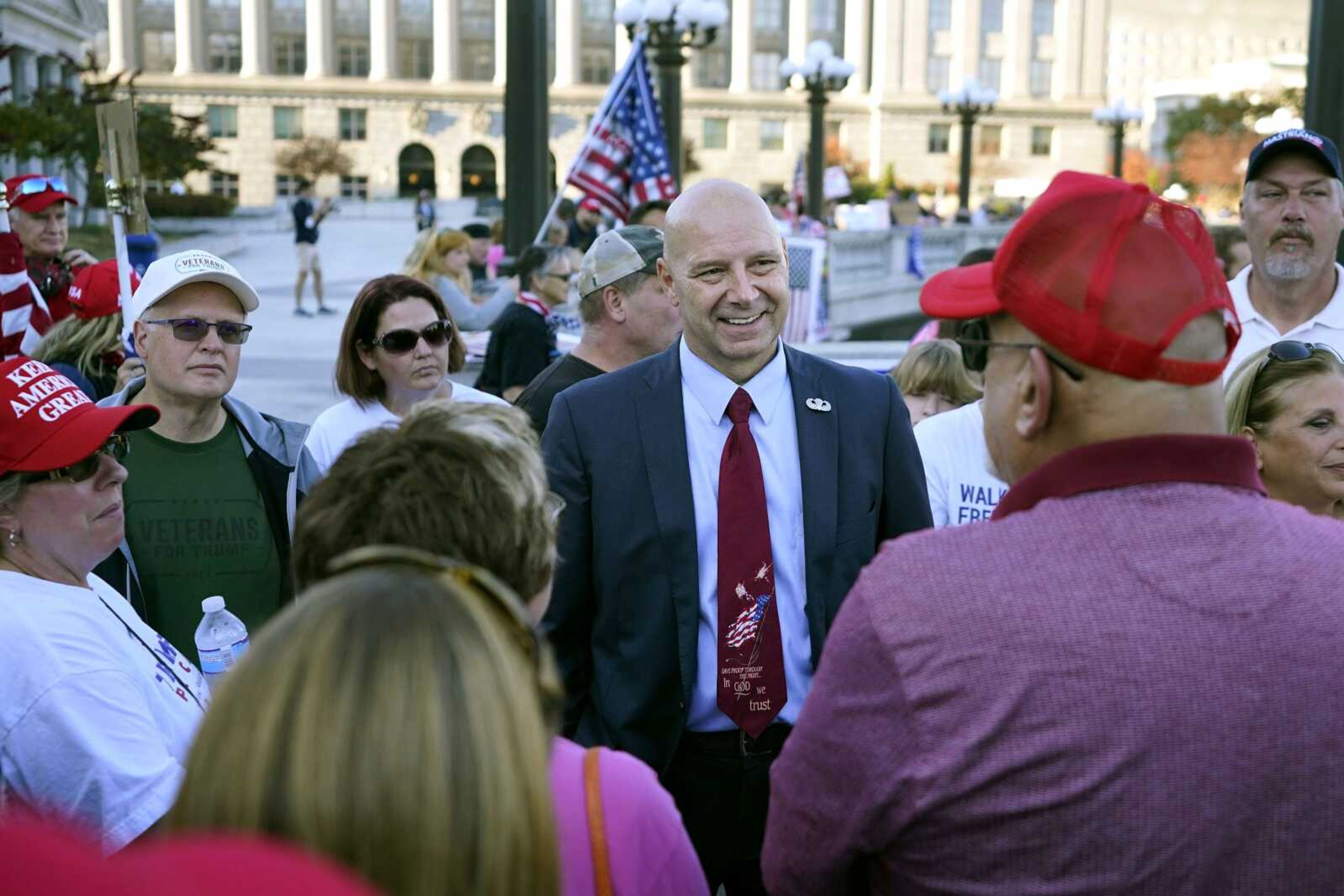 Pennsylvania state Sen. Doug Mastriano, R-Franklin, center, speaks to supporters of President Donald Trump as they demonstrate Nov. 7 outside the Pennsylvania State Capitol in Harrisburg, Pennsylvania.