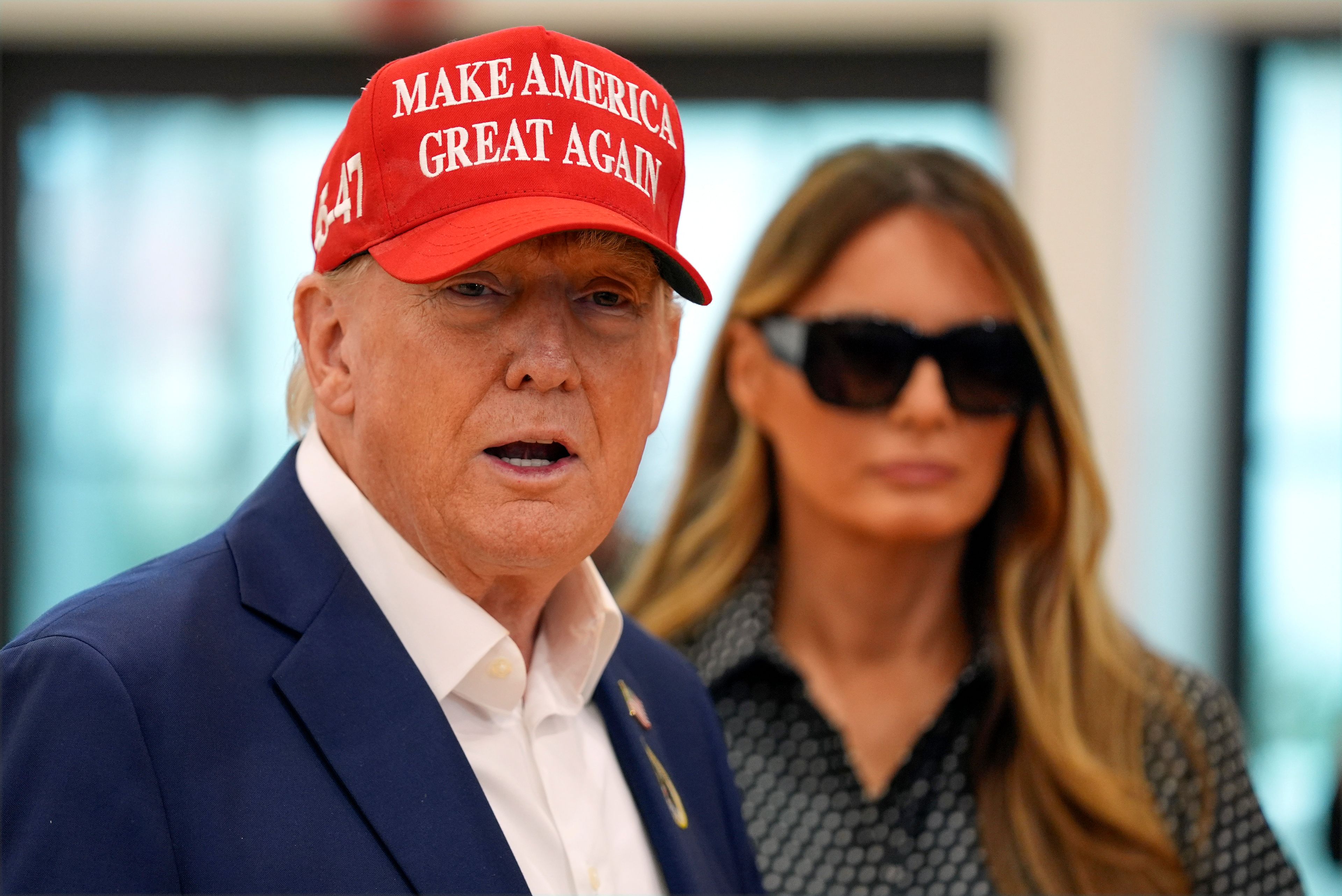 Republican presidential nominee former President Donald Trump speaks as former first lady Melania Trump listens after they voted on Election Day at the Morton and Barbara Mandel Recreation Center, Tuesday, Nov. 5, 2024, in Palm Beach, Fla. (AP Photo/Evan Vucci)